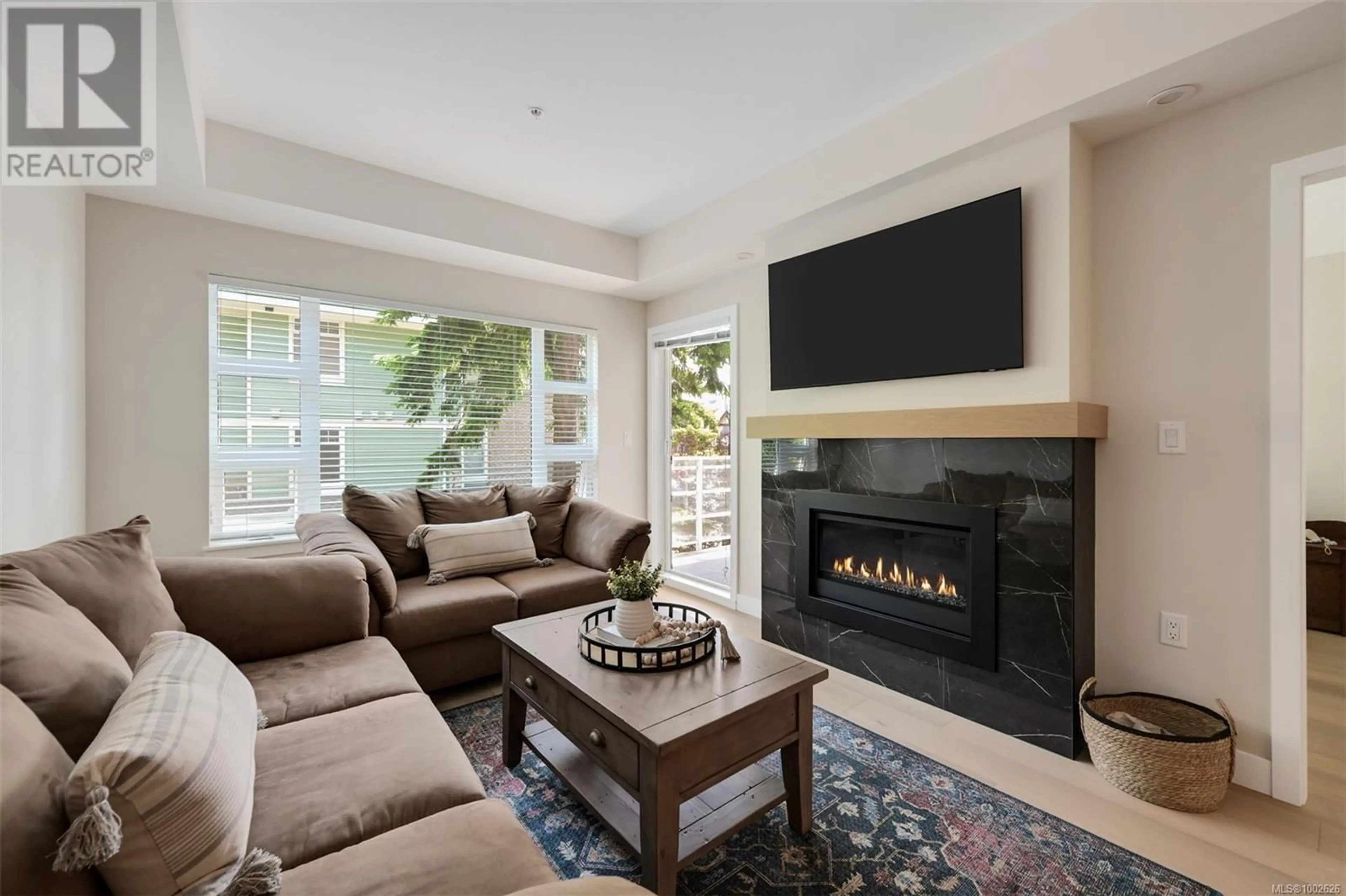 Living room with furniture, unknown for 204 - 9861 THIRD STREET, Sidney British Columbia V8L3A8