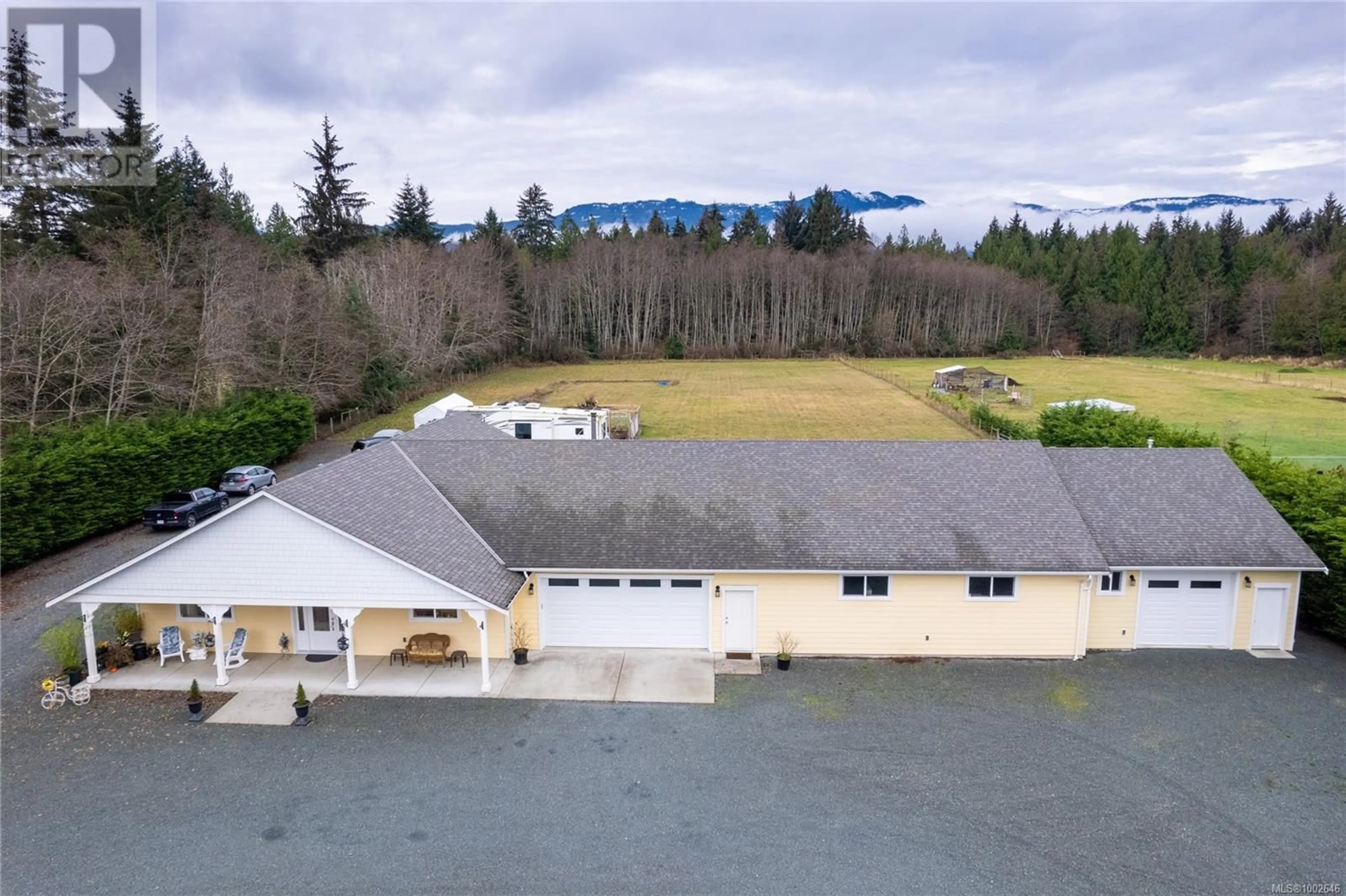 A pic from outside/outdoor area/front of a property/back of a property/a pic from drone, mountain view for 5180 GAINSBERG ROAD EAST, Bowser British Columbia V0R1G0