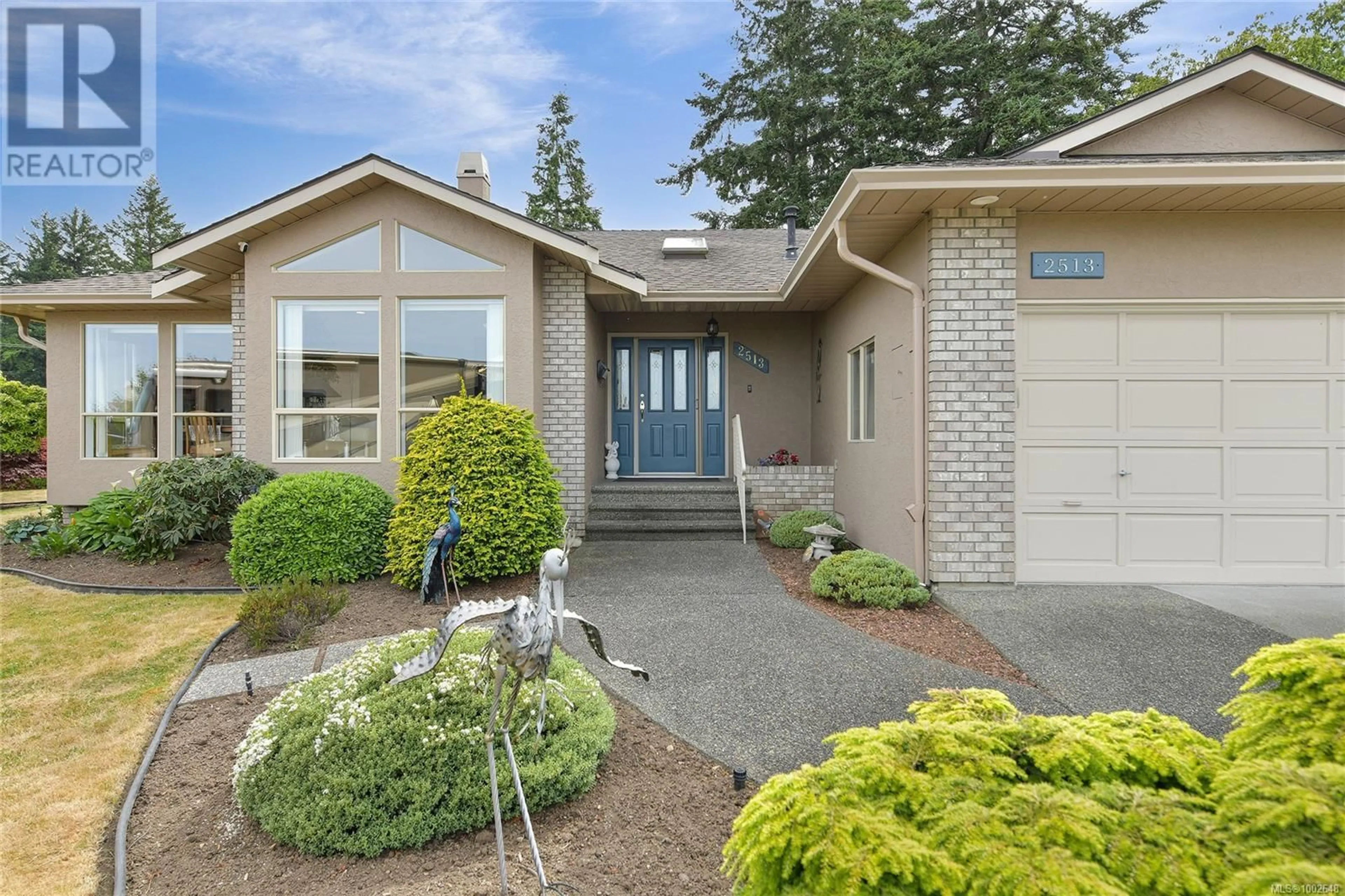 Home with vinyl exterior material, street for 2513 EMMY PLACE, Central Saanich British Columbia V8Z7W7