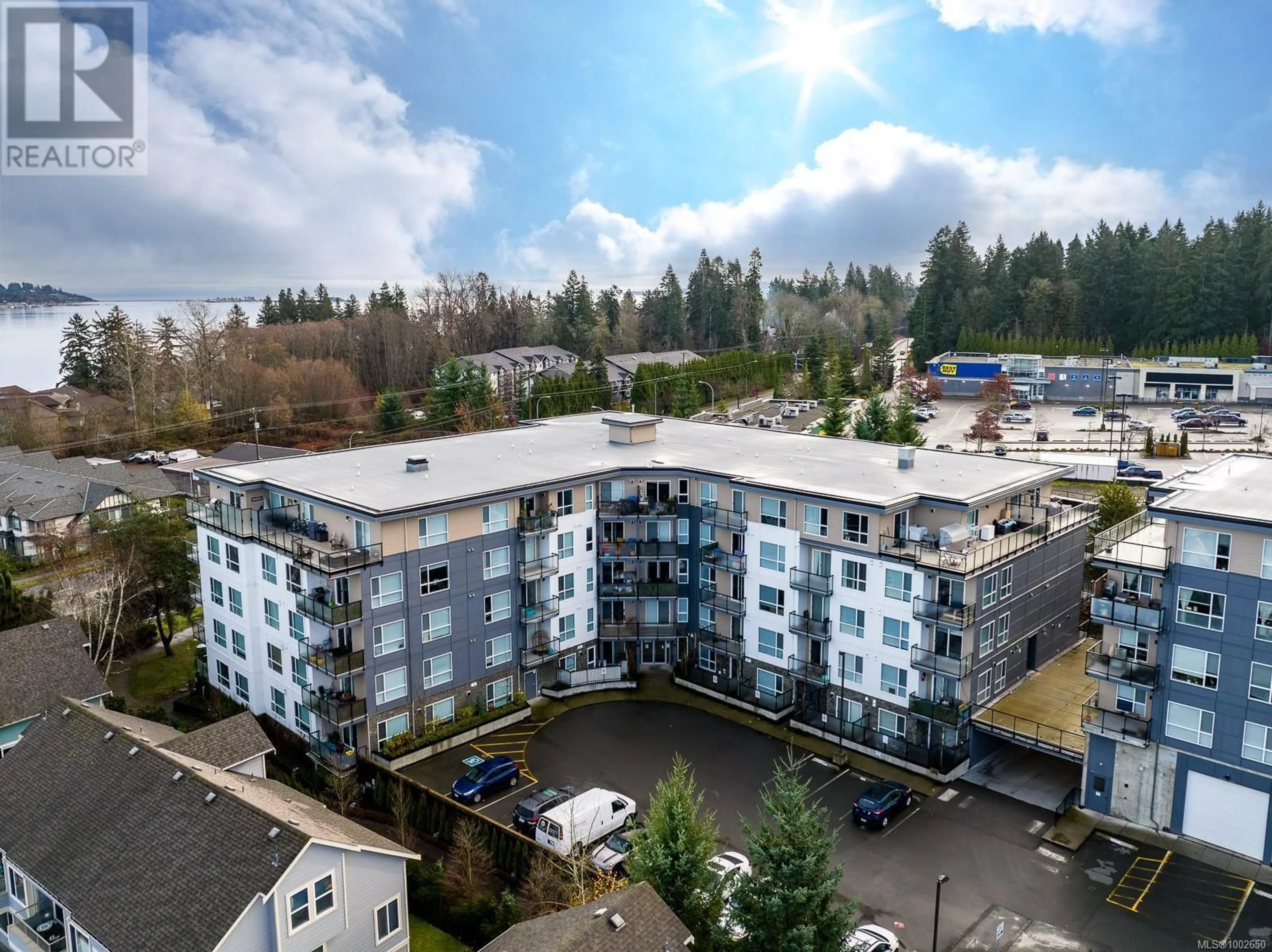 A pic from outside/outdoor area/front of a property/back of a property/a pic from drone, building for 110 - 3070 KILPATRICK AVENUE, Courtenay British Columbia V9N0G7