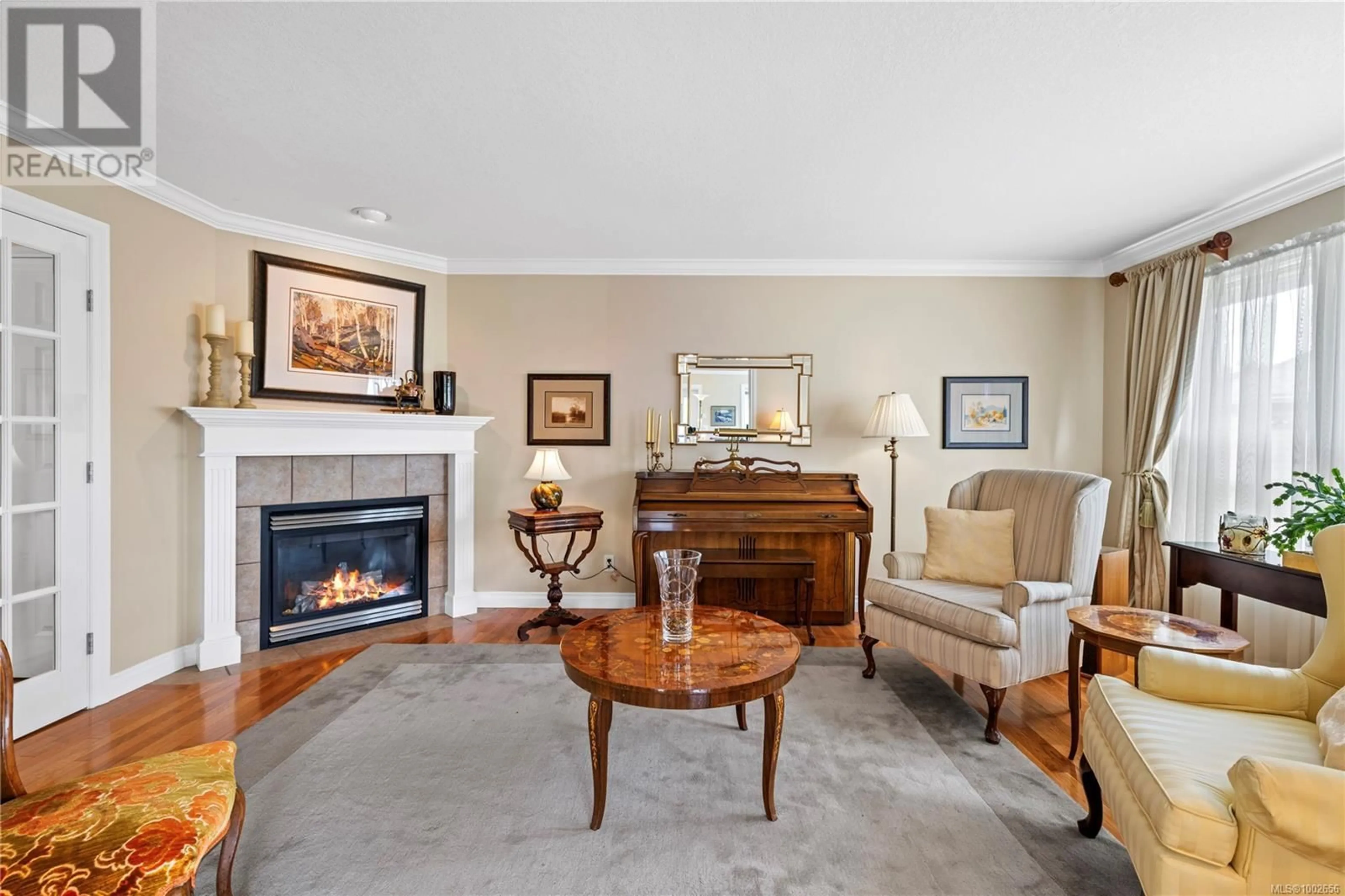 Living room with furniture, unknown for 689 AQUARIUS PLACE, Qualicum Beach British Columbia V9K2P3