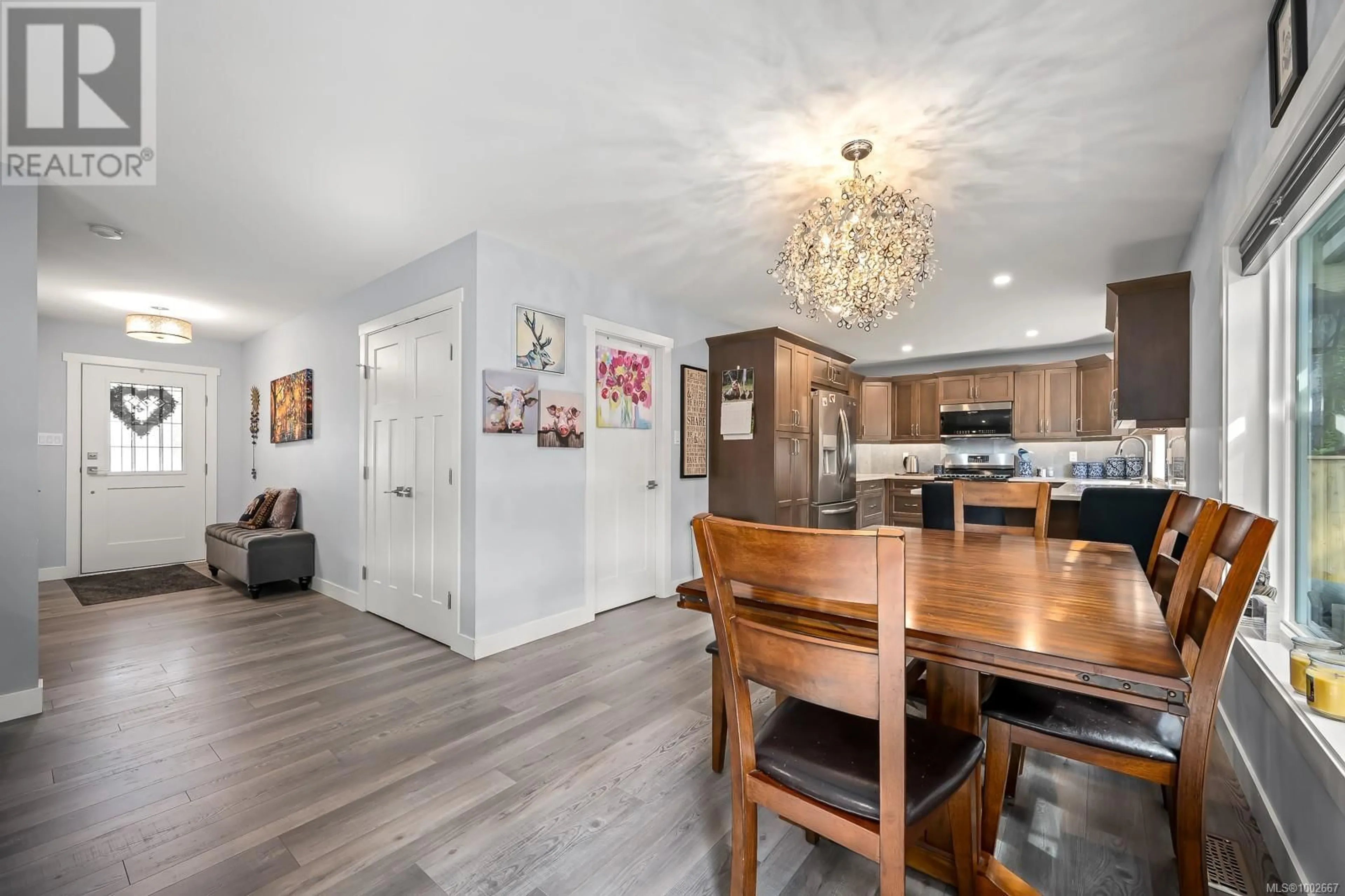 Open concept kitchen, wood/laminate floor for 180 - 303 ARDEN ROAD, Courtenay British Columbia V9N0A8