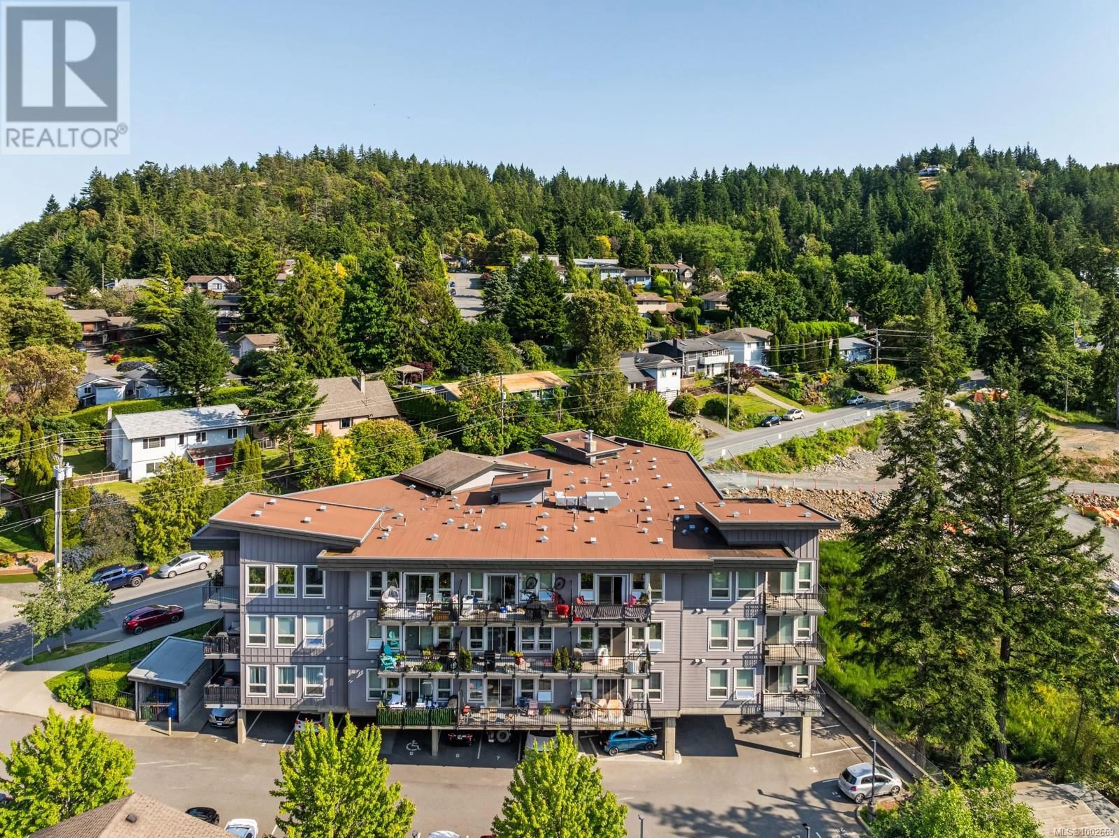 A pic from outside/outdoor area/front of a property/back of a property/a pic from drone, unknown for 411 - 3240 JACKLIN ROAD, Langford British Columbia V9C3T6