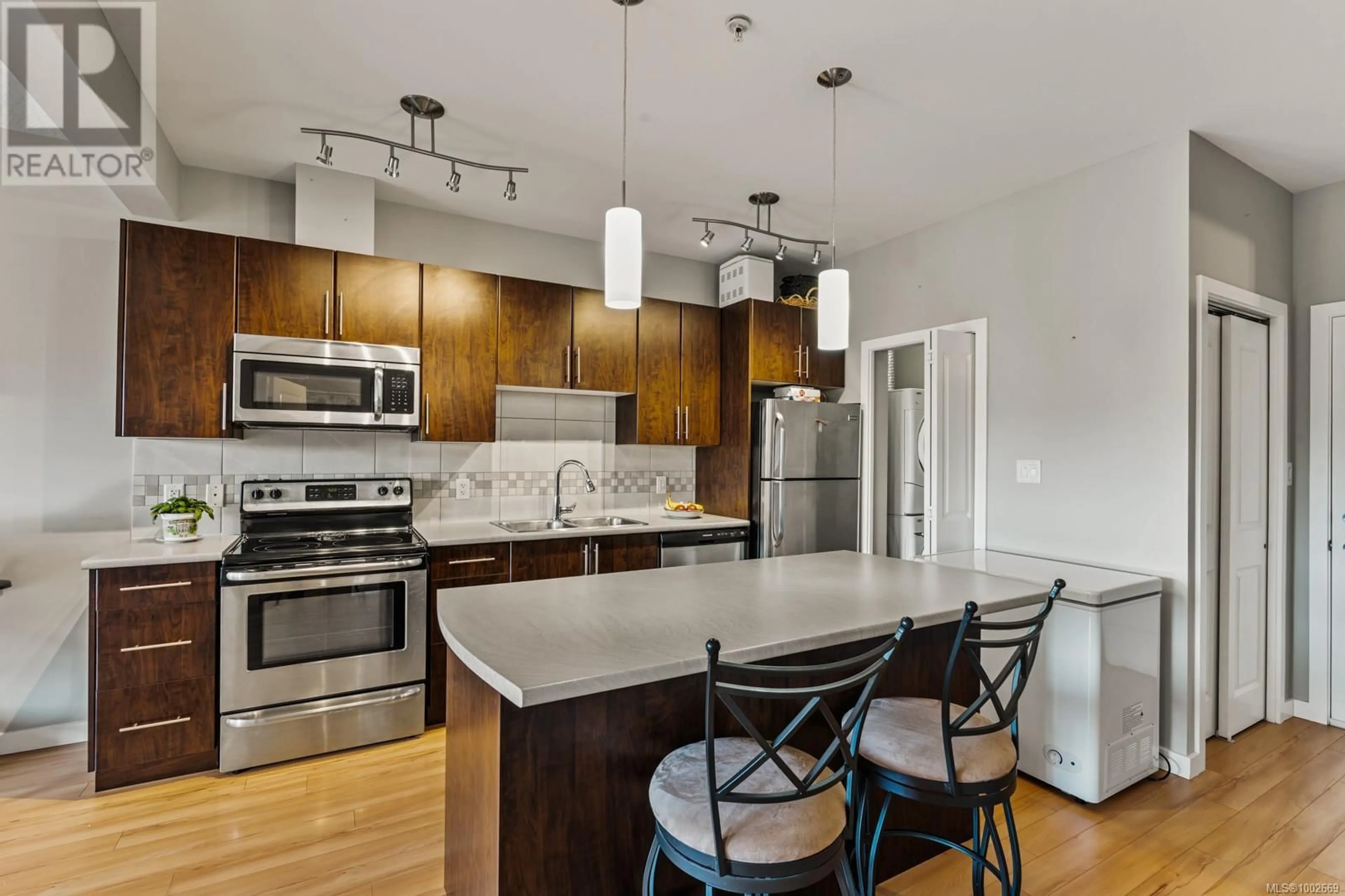 Open concept kitchen, unknown for 411 - 3240 JACKLIN ROAD, Langford British Columbia V9C3T6