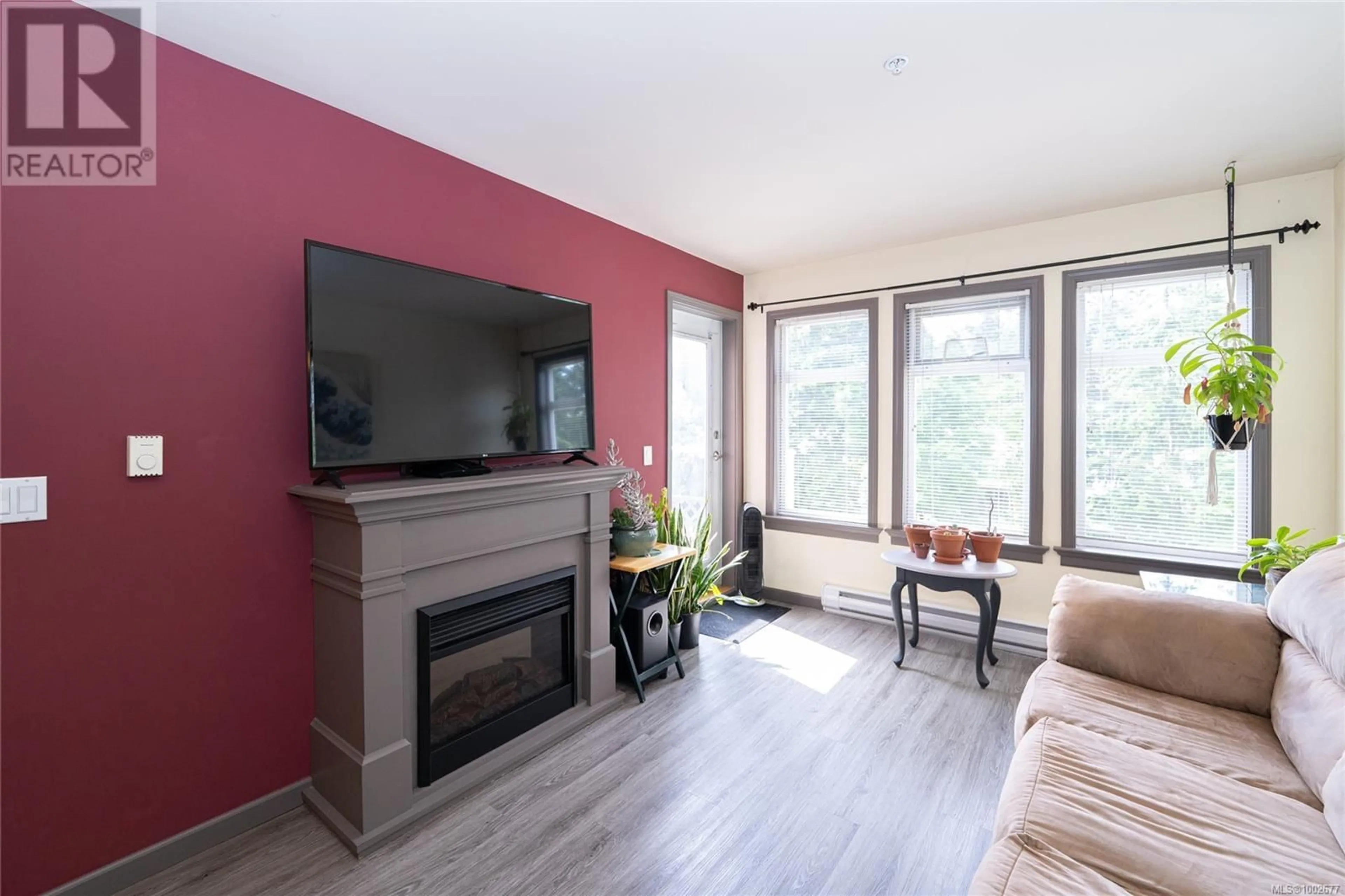 Living room with furniture, wood/laminate floor for 301 - 663 GOLDSTREAM AVENUE, Langford British Columbia V9B2W8