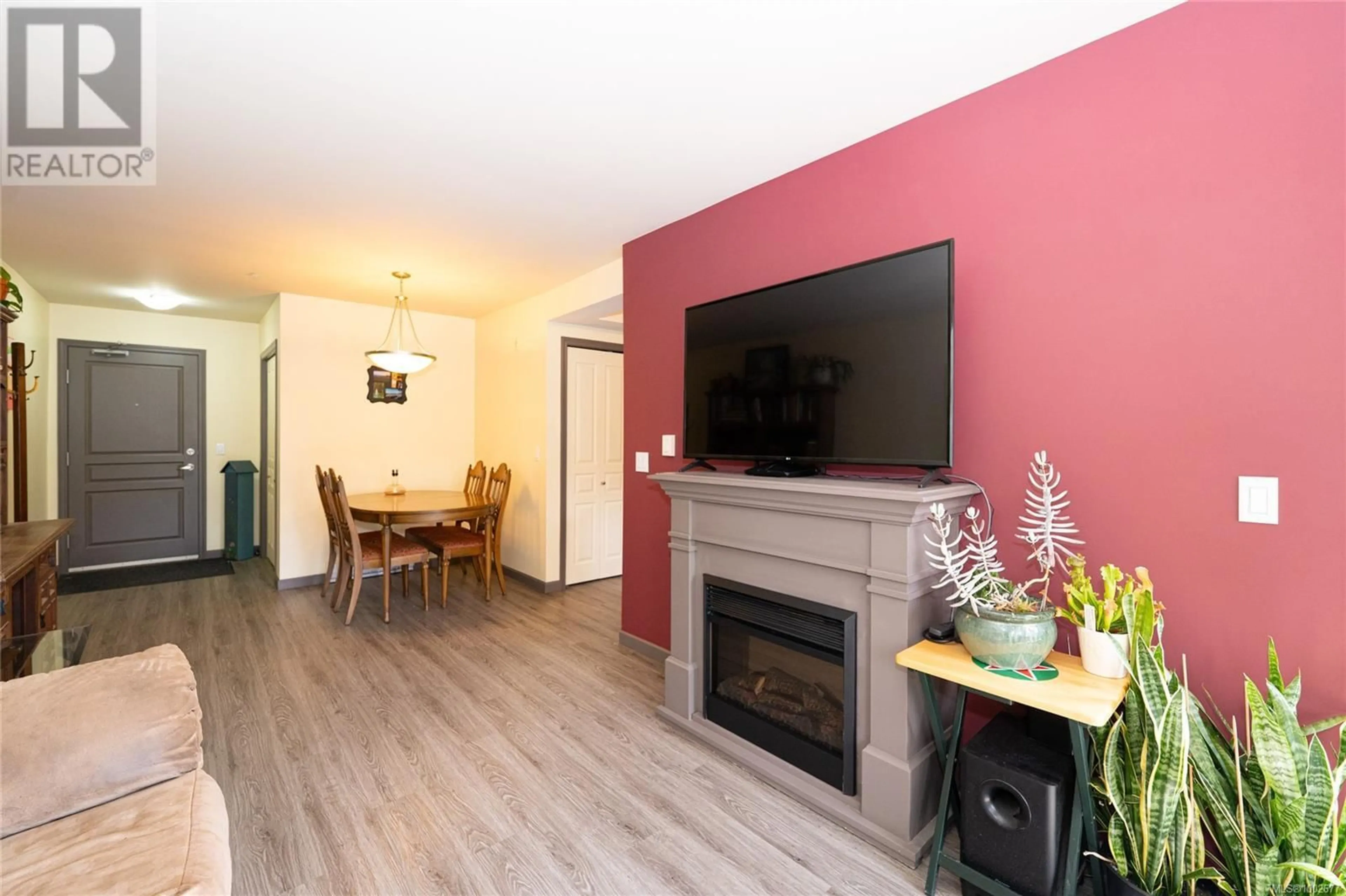 Living room with furniture, wood/laminate floor for 301 - 663 GOLDSTREAM AVENUE, Langford British Columbia V9B2W8