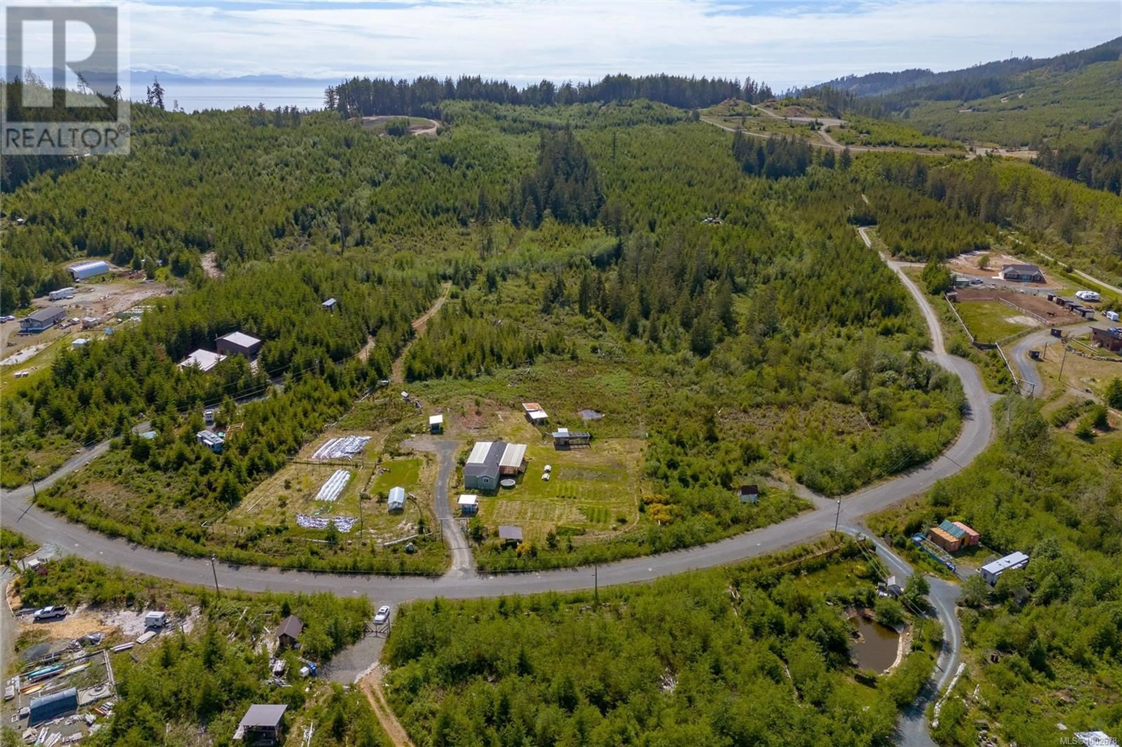 A pic from outside/outdoor area/front of a property/back of a property/a pic from drone, forest/trees view for 2845 KIRBY CREEK ROAD, Sooke British Columbia V9Z1G4