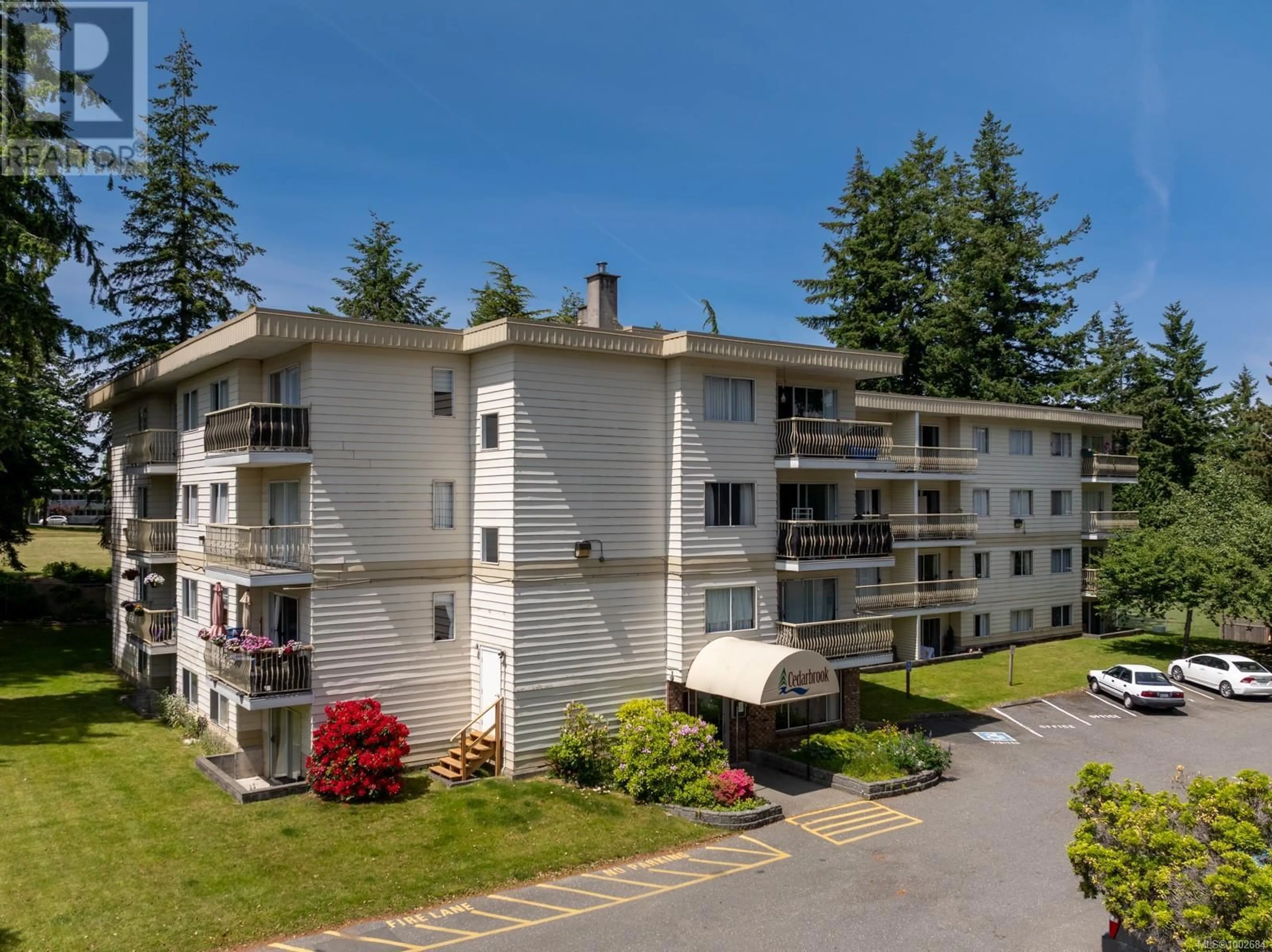 A pic from outside/outdoor area/front of a property/back of a property/a pic from drone, unknown for 409 - 322 BIRCH STREET, Campbell River British Columbia V9W2S6