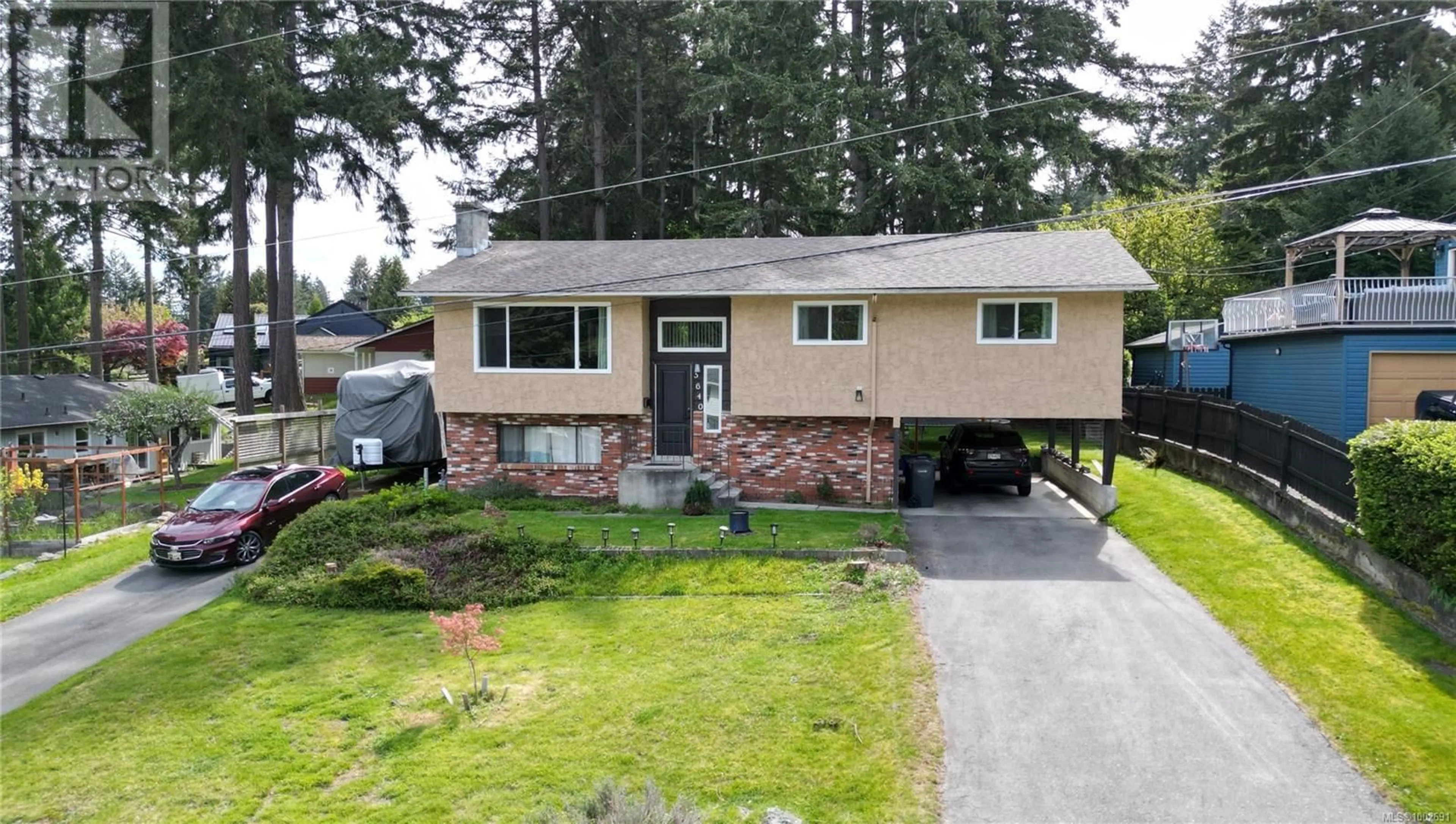 Home with vinyl exterior material, street for 5640 BIG WHALE LOOKOUT, Nanaimo British Columbia V9T5G7