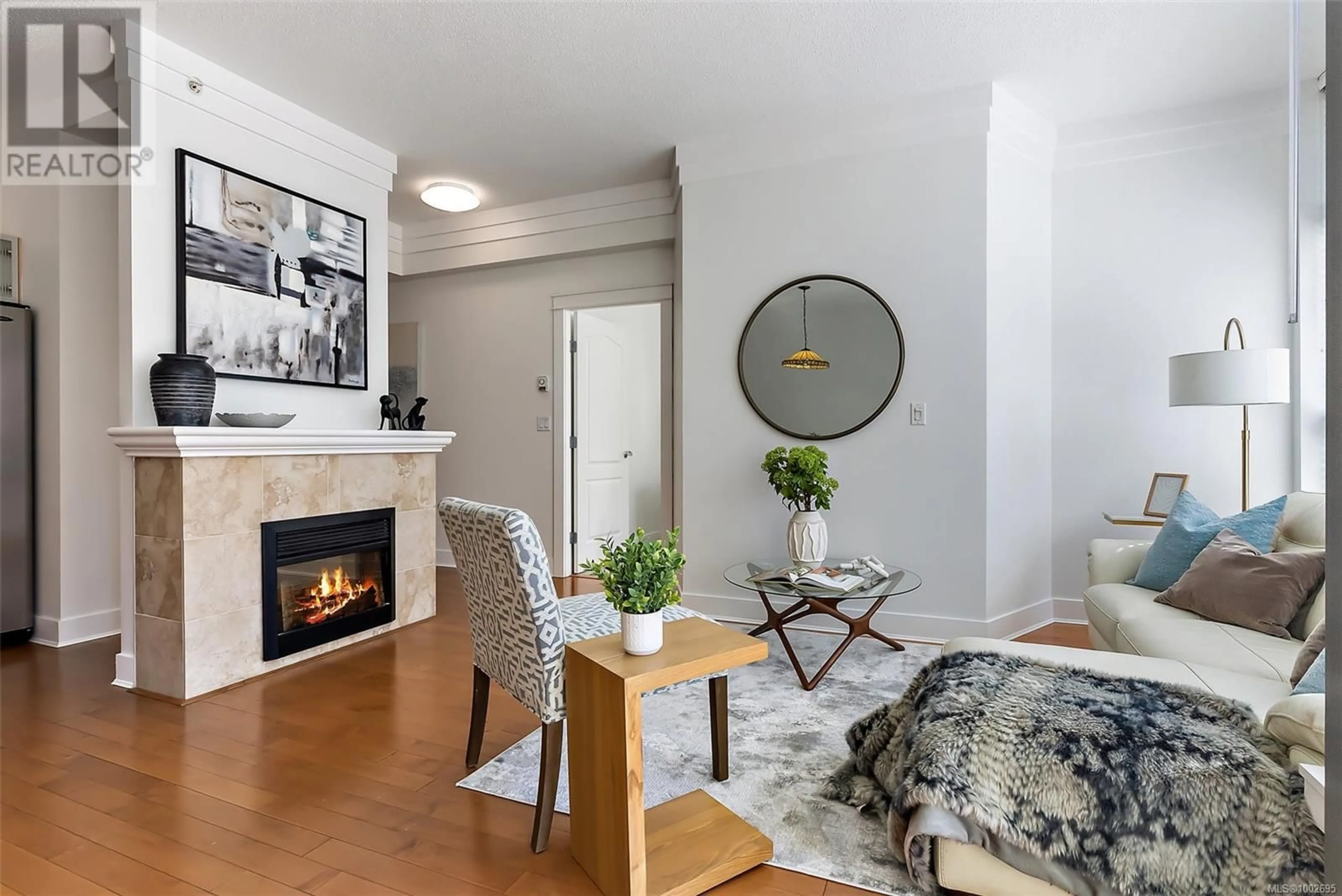 Living room with furniture, wood/laminate floor for 304 - 845 YATES STREET, Victoria British Columbia V8W4A3