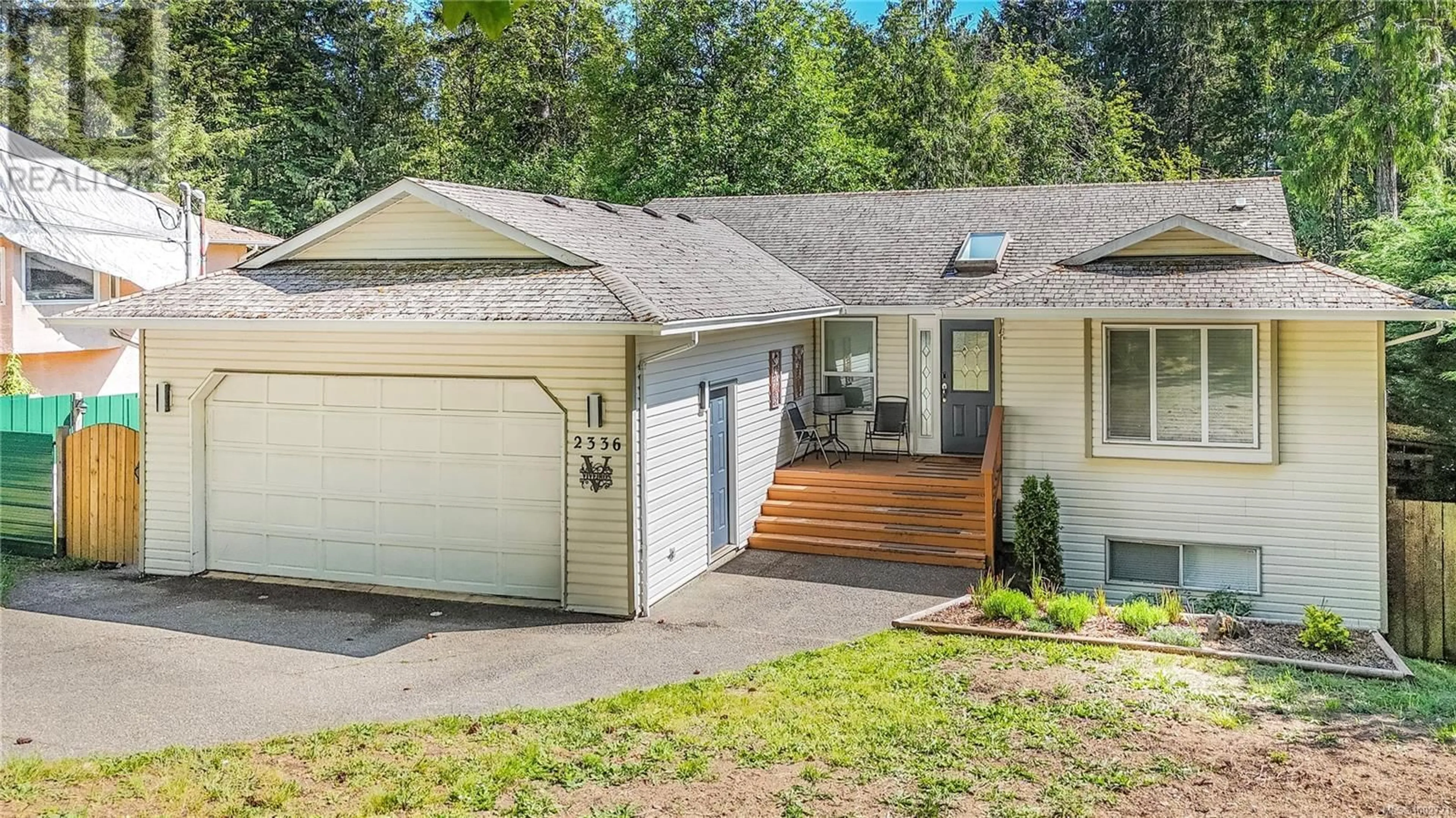 Home with vinyl exterior material, street for 2336 RAVENHILL ROAD, Shawnigan Lake British Columbia V0R2W1