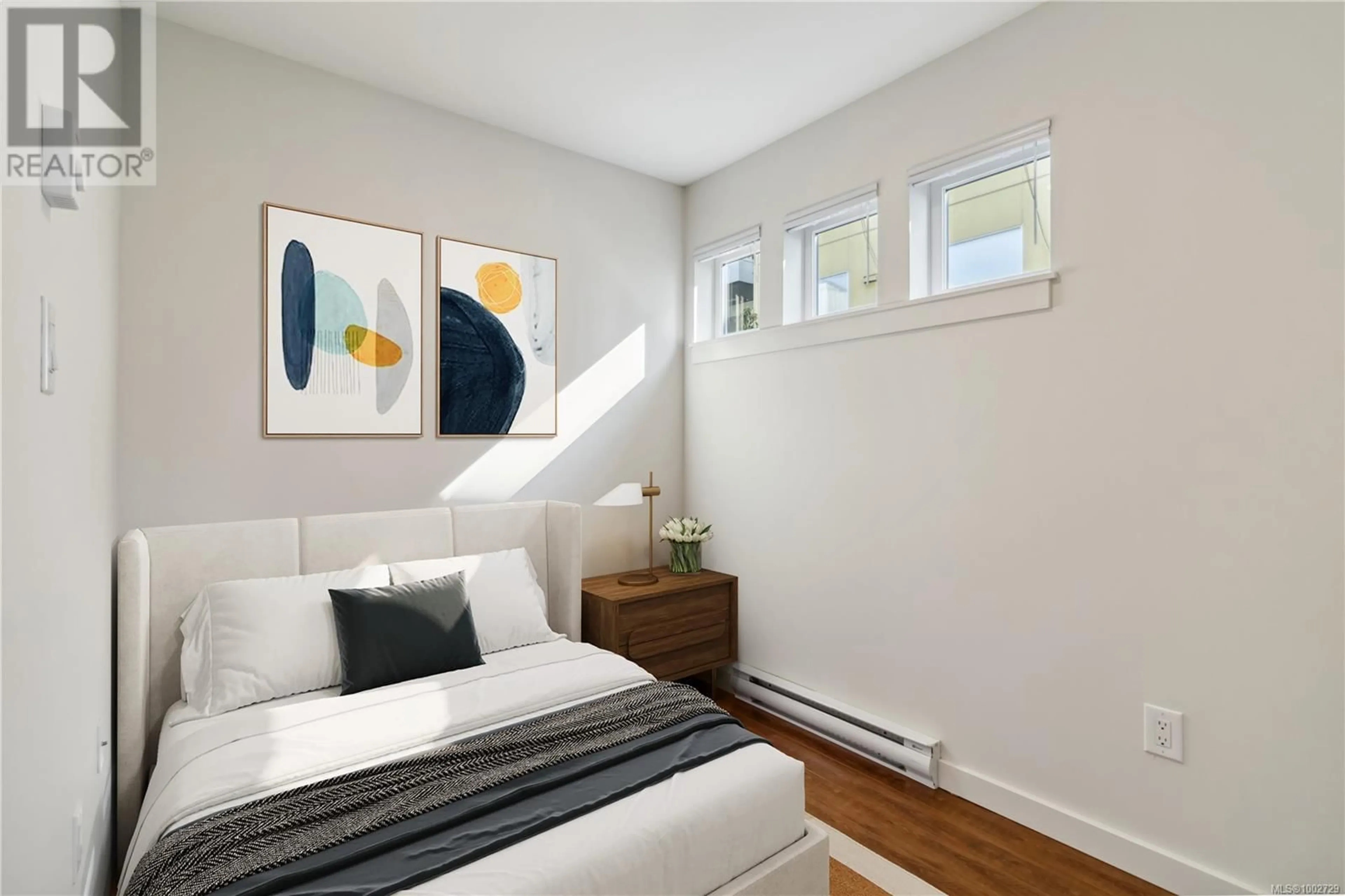 Bedroom with bed, wood/laminate floor for 308 - 1405 ESQUIMALT ROAD, Esquimalt British Columbia V9A0A4