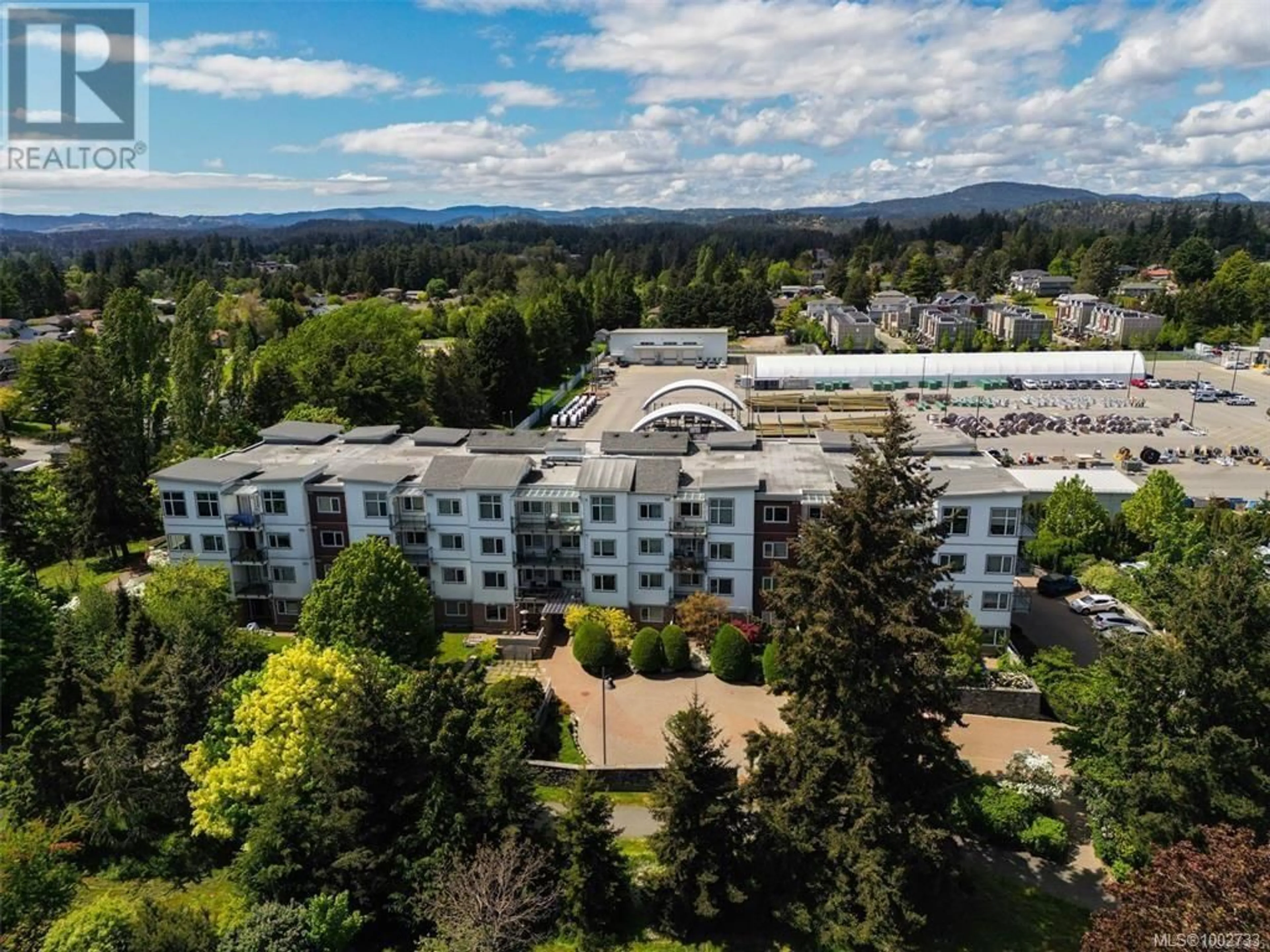 A pic from outside/outdoor area/front of a property/back of a property/a pic from drone, mountain view for 201 - 4394 WEST SAANICH ROAD, Saanich British Columbia V8Z3E9