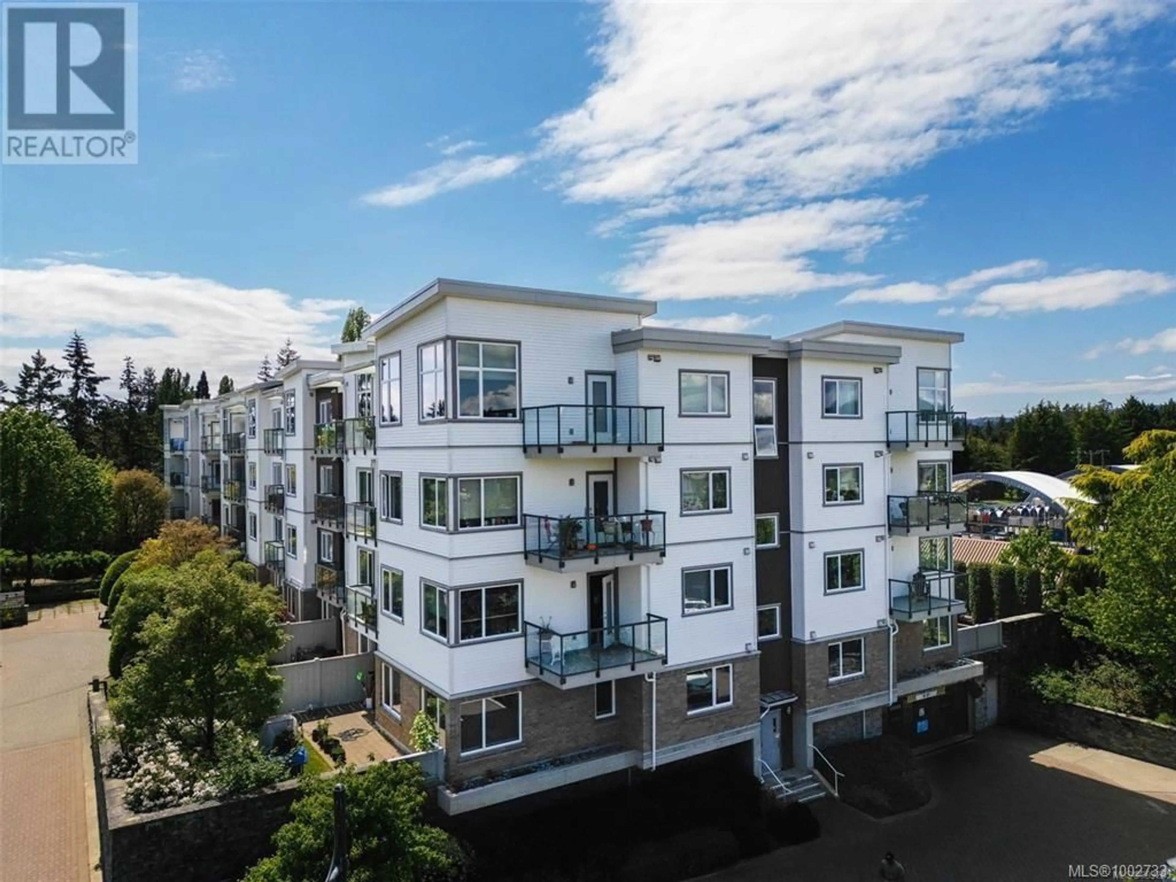 A pic from outside/outdoor area/front of a property/back of a property/a pic from drone, city buildings view from balcony for 201 - 4394 WEST SAANICH ROAD, Saanich British Columbia V8Z3E9