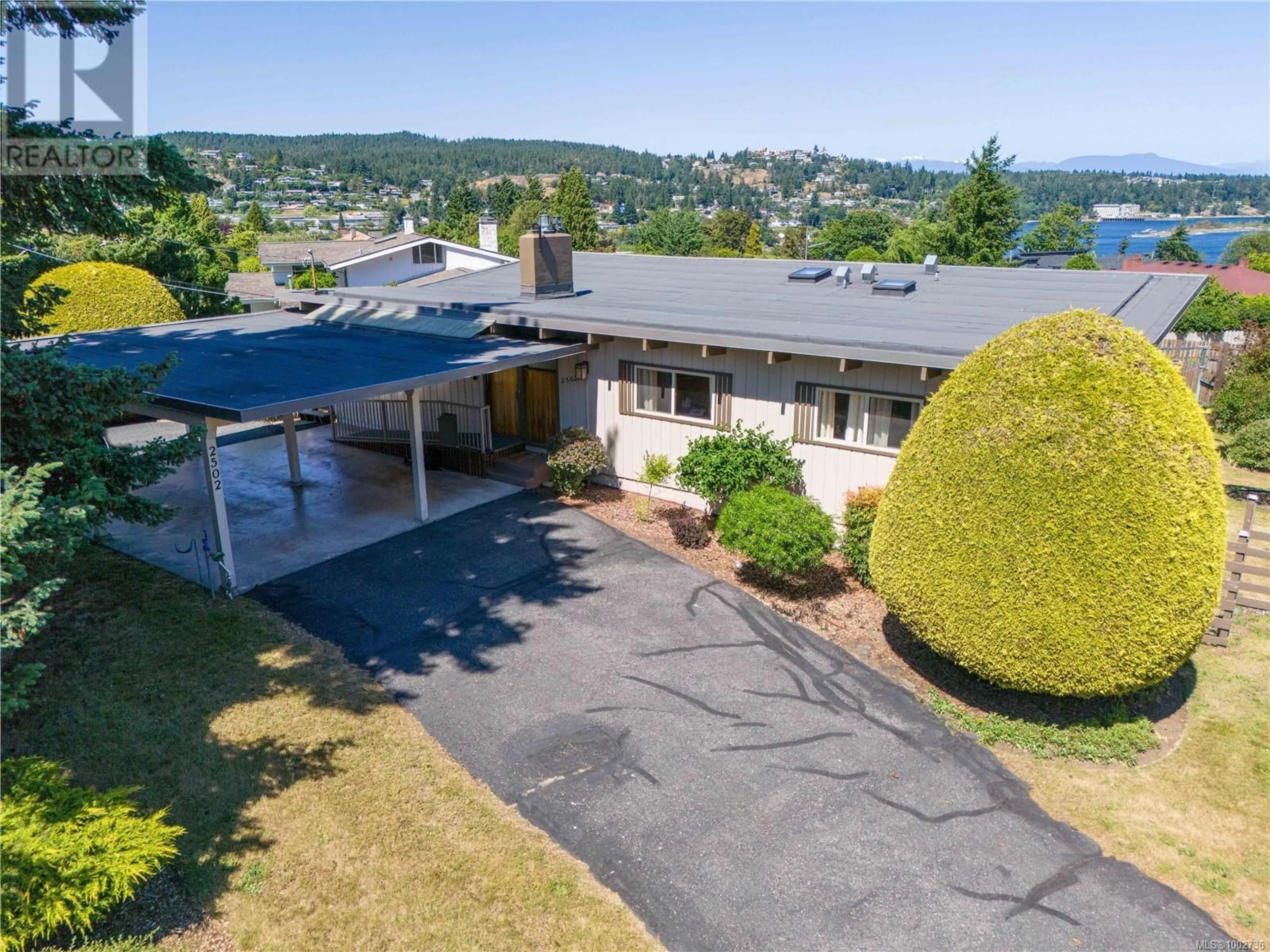 A pic from outside/outdoor area/front of a property/back of a property/a pic from drone, mountain view for 2502 HOLYROOD DRIVE, Nanaimo British Columbia V9S4K9