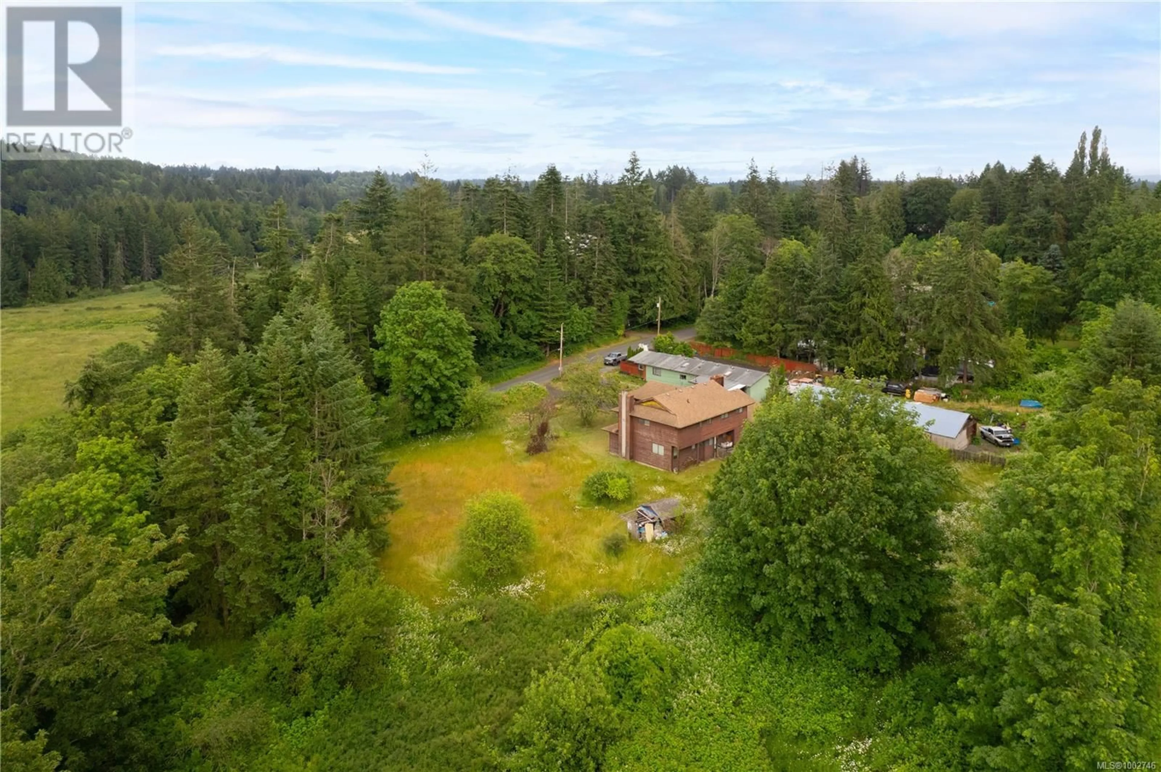 A pic from outside/outdoor area/front of a property/back of a property/a pic from drone, forest/trees view for 1419 WHITE ROAD NORTH, Nanaimo British Columbia V9X1N2