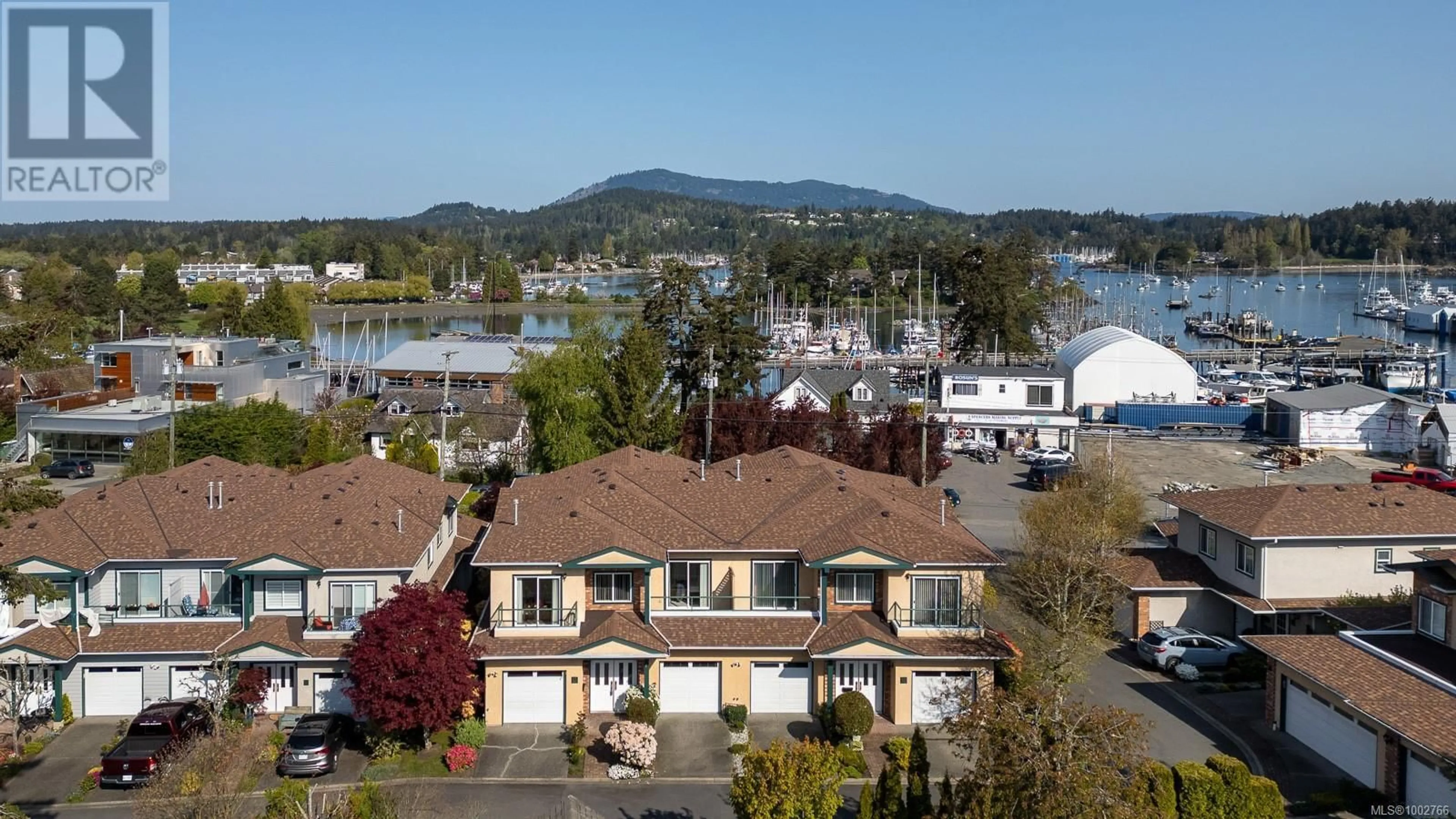 A pic from outside/outdoor area/front of a property/back of a property/a pic from drone, water/lake/river/ocean view for 10 - 2235 HARBOUR ROAD, Sidney British Columbia V8L2P7