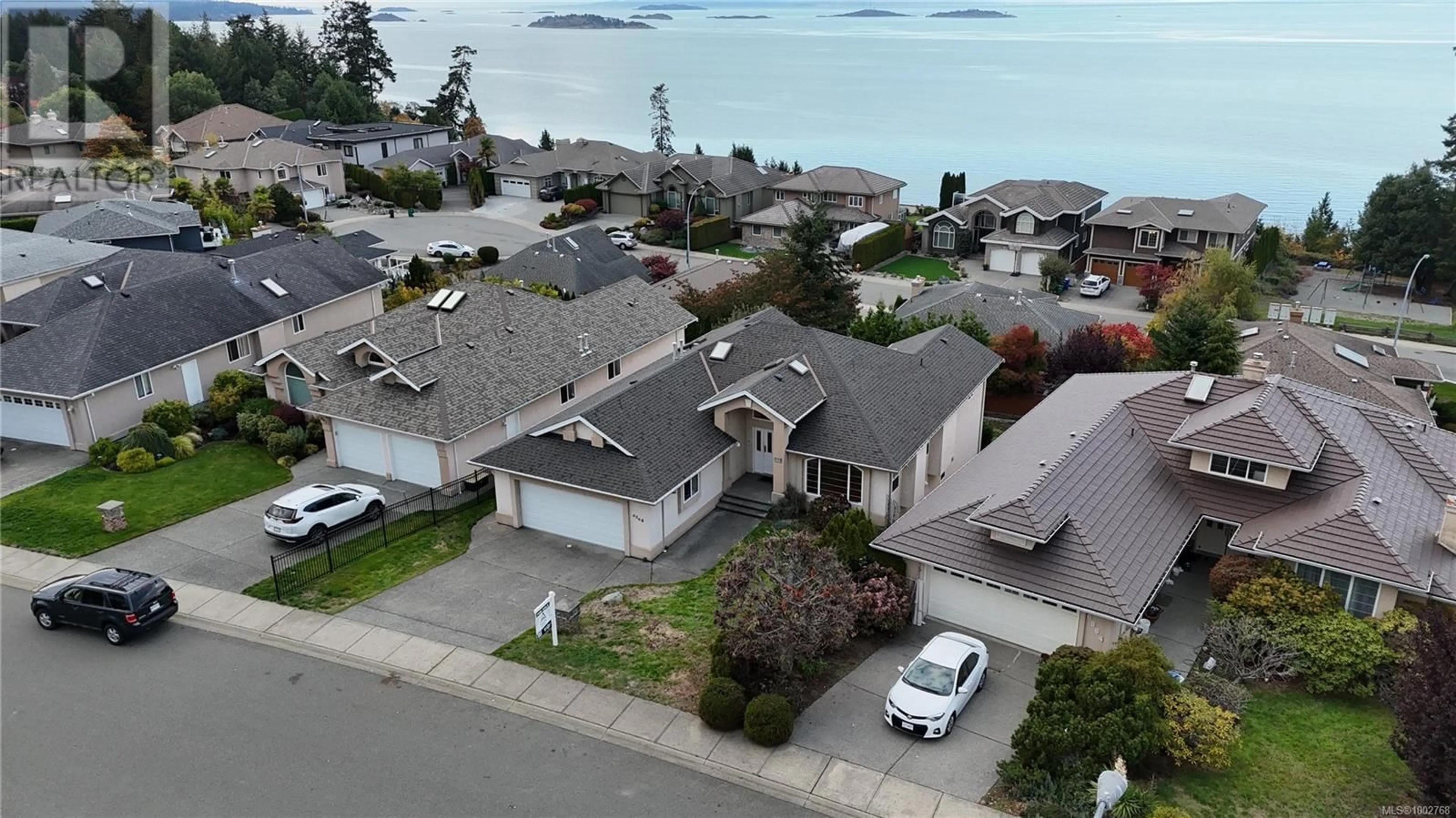 A pic from outside/outdoor area/front of a property/back of a property/a pic from drone, water/lake/river/ocean view for 6568 PELICAN WAY, Nanaimo British Columbia V9V1P9
