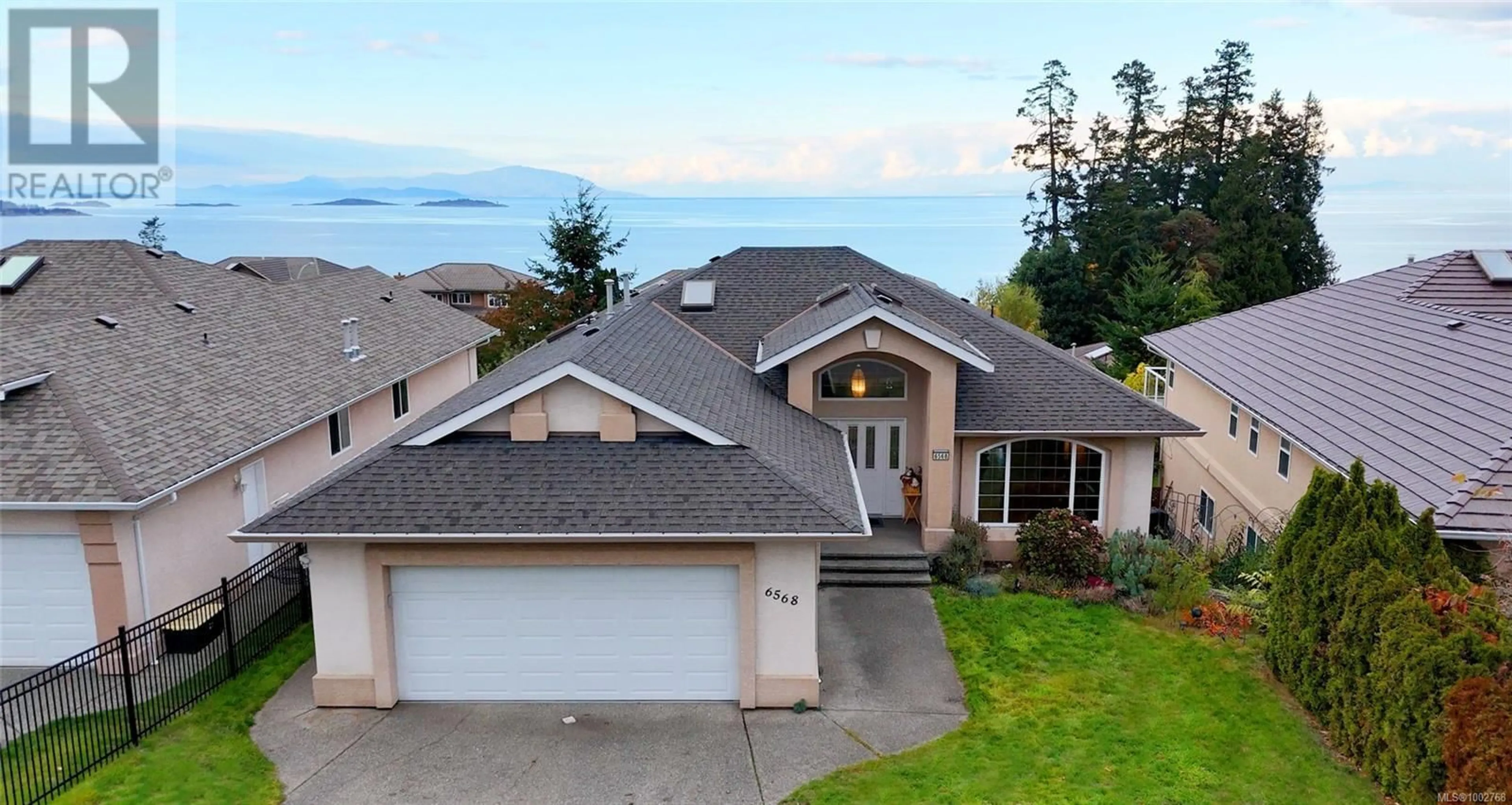 A pic from outside/outdoor area/front of a property/back of a property/a pic from drone, water/lake/river/ocean view for 6568 PELICAN WAY, Nanaimo British Columbia V9V1P9
