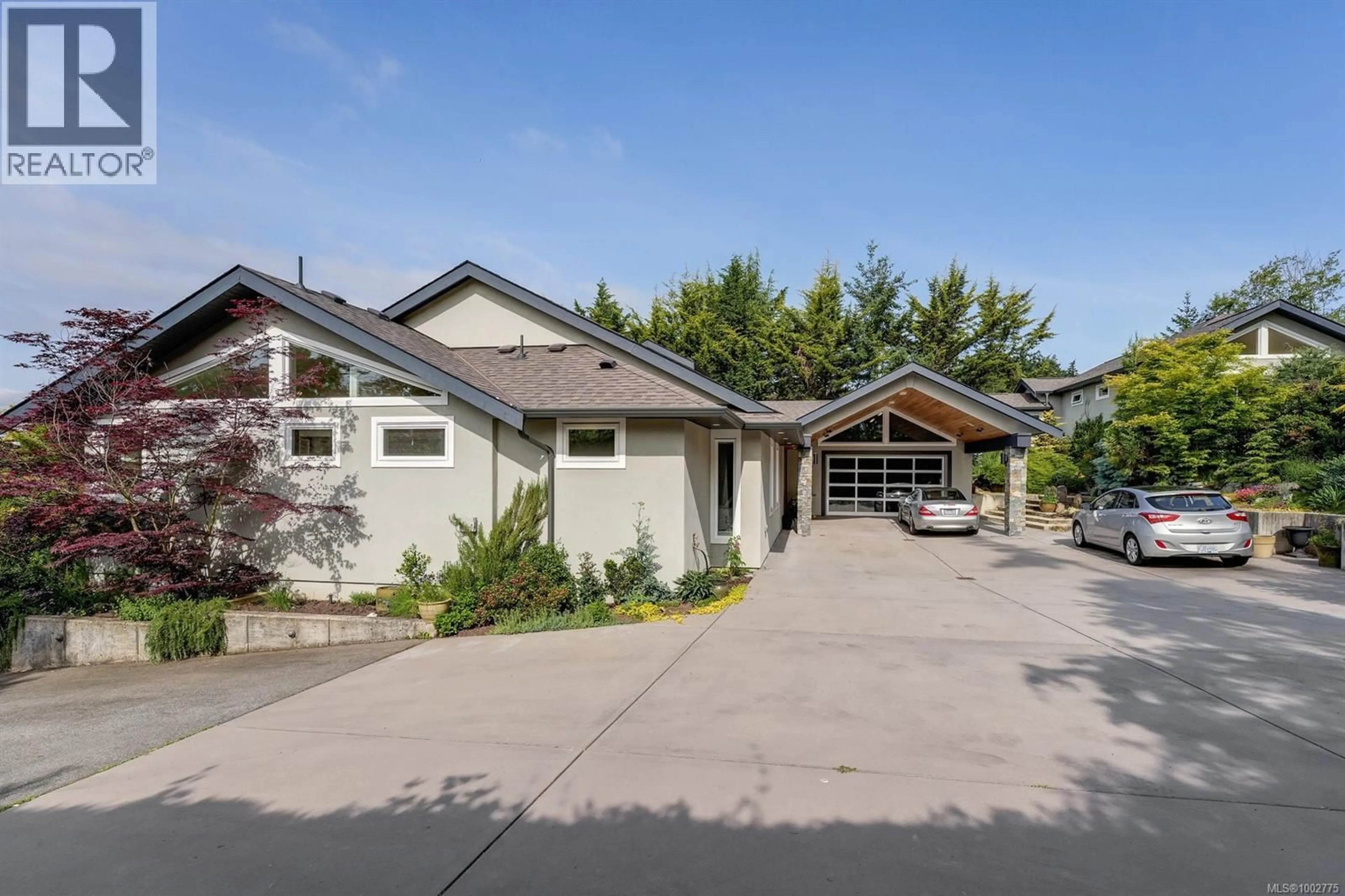 Home with vinyl exterior material, street for 11333 CHALET ROAD, North Saanich British Columbia V8L5L9