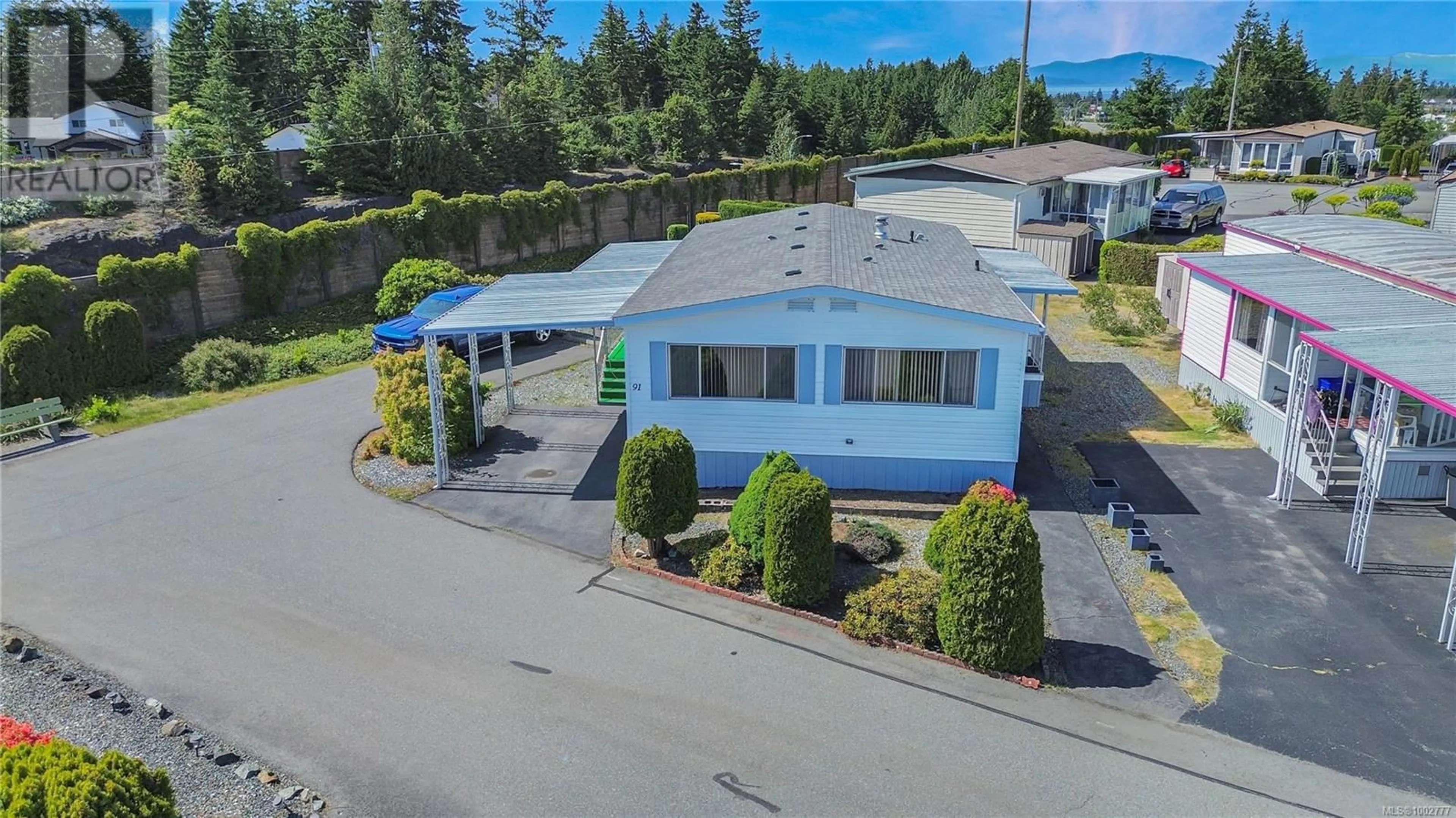 A pic from outside/outdoor area/front of a property/back of a property/a pic from drone, building for 91 - 6325 METRAL DRIVE, Nanaimo British Columbia V9T6P9