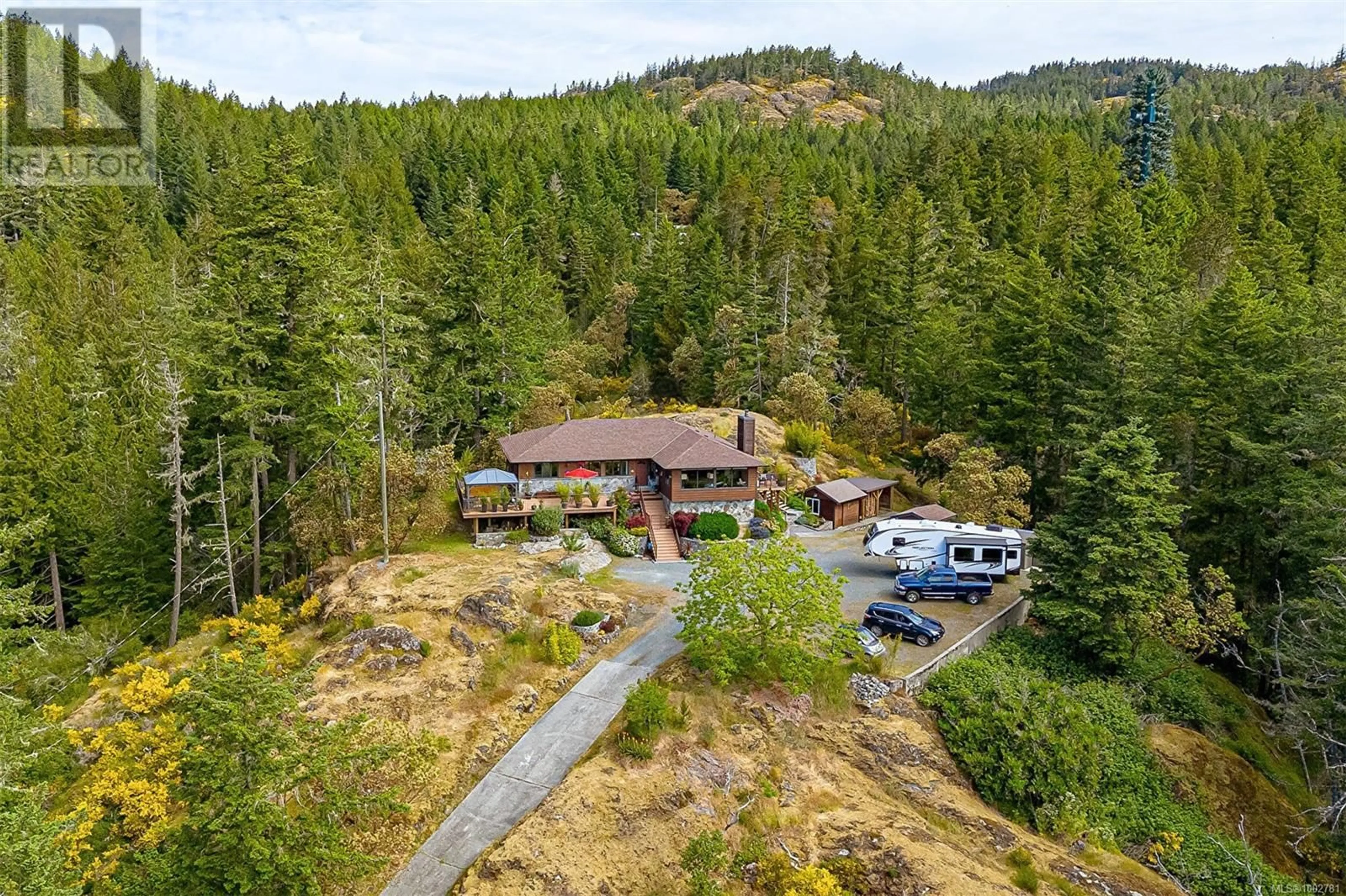 A pic from outside/outdoor area/front of a property/back of a property/a pic from drone, forest/trees view for 5154 SOOKE ROAD, Sooke British Columbia V9Z0E3