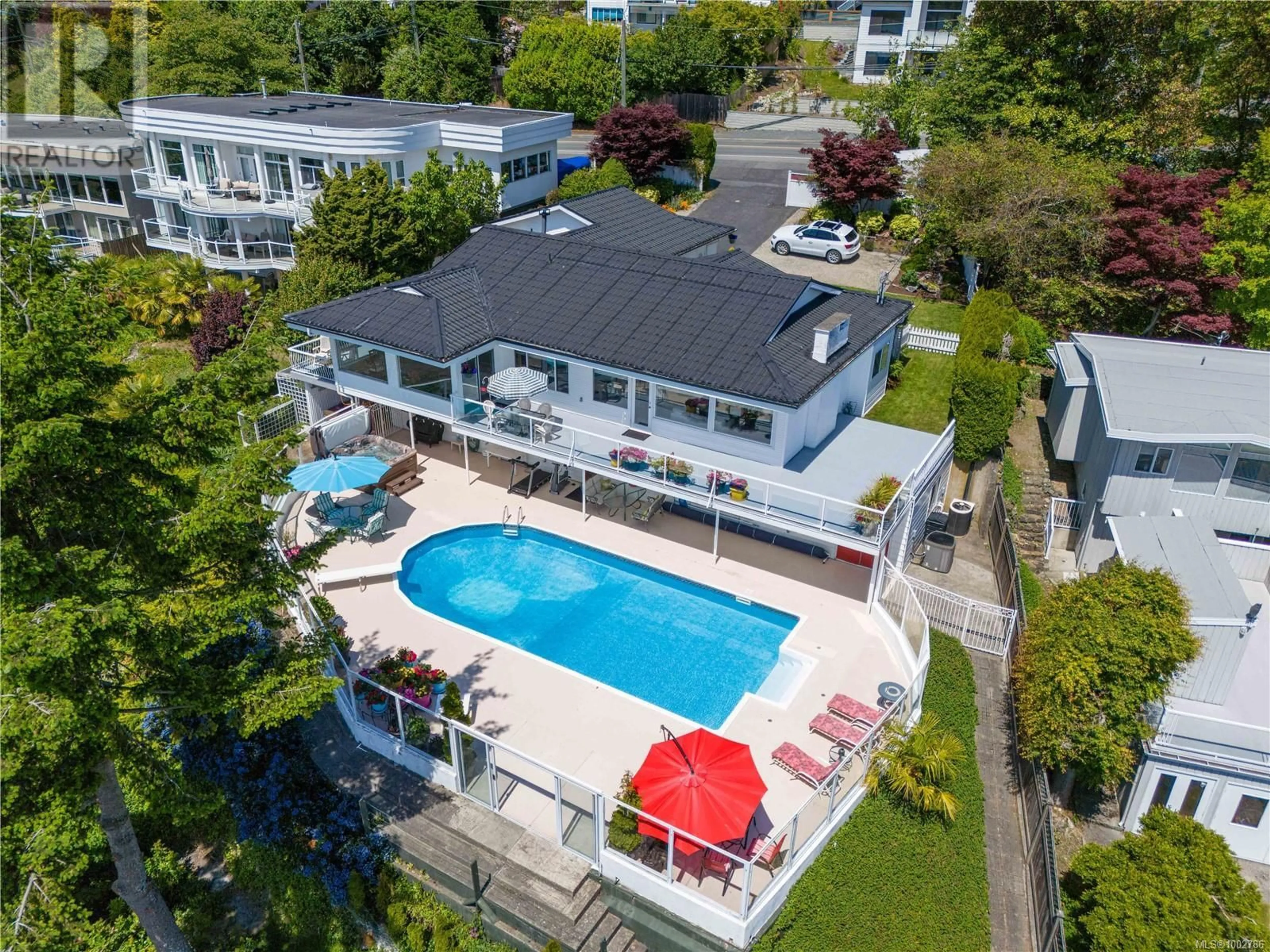 A pic from outside/outdoor area/front of a property/back of a property/a pic from drone, water/lake/river/ocean view for 2920 HAMMOND BAY ROAD, Nanaimo British Columbia V9T1E2