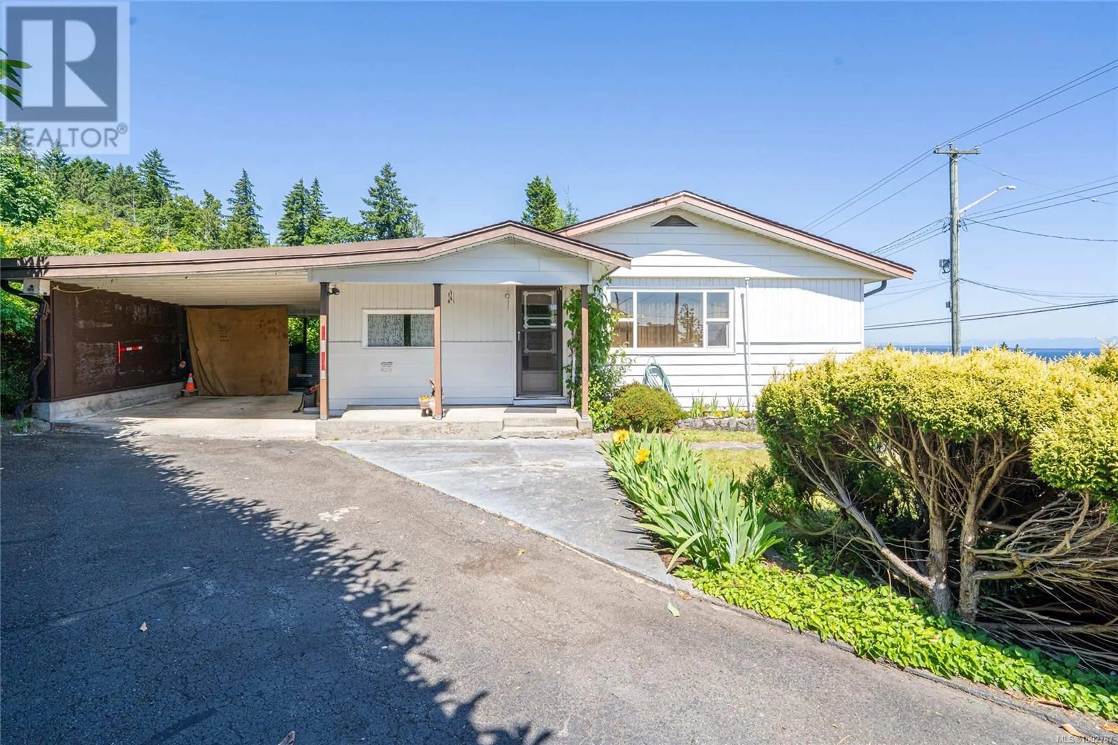 Home with vinyl exterior material, street for 10126 OLD VICTORIA ROAD SOUTHWEST, Chemainus British Columbia V0R1K2