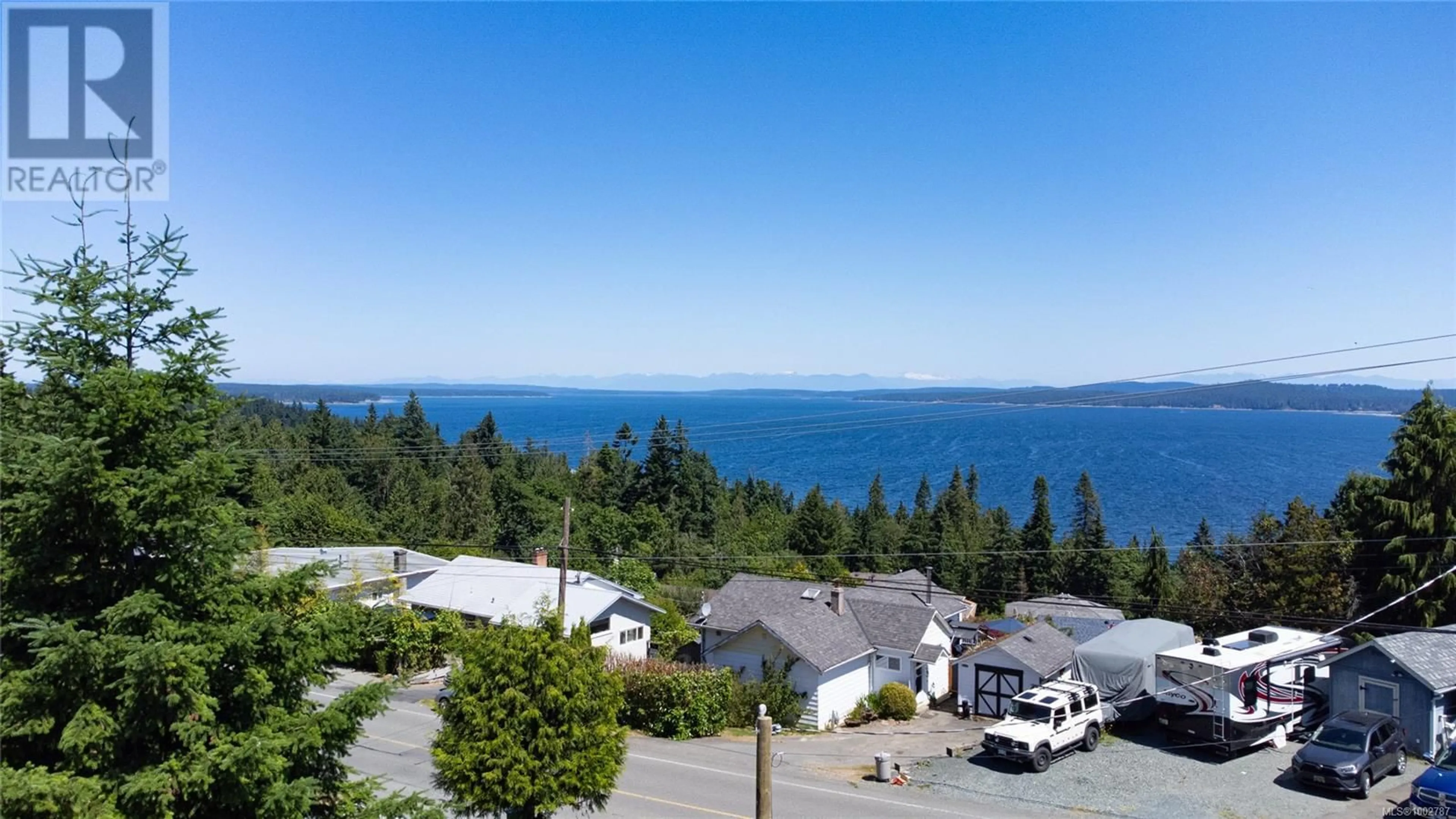 A pic from outside/outdoor area/front of a property/back of a property/a pic from drone, water/lake/river/ocean view for 10126 OLD VICTORIA ROAD SOUTHWEST, Chemainus British Columbia V0R1K2