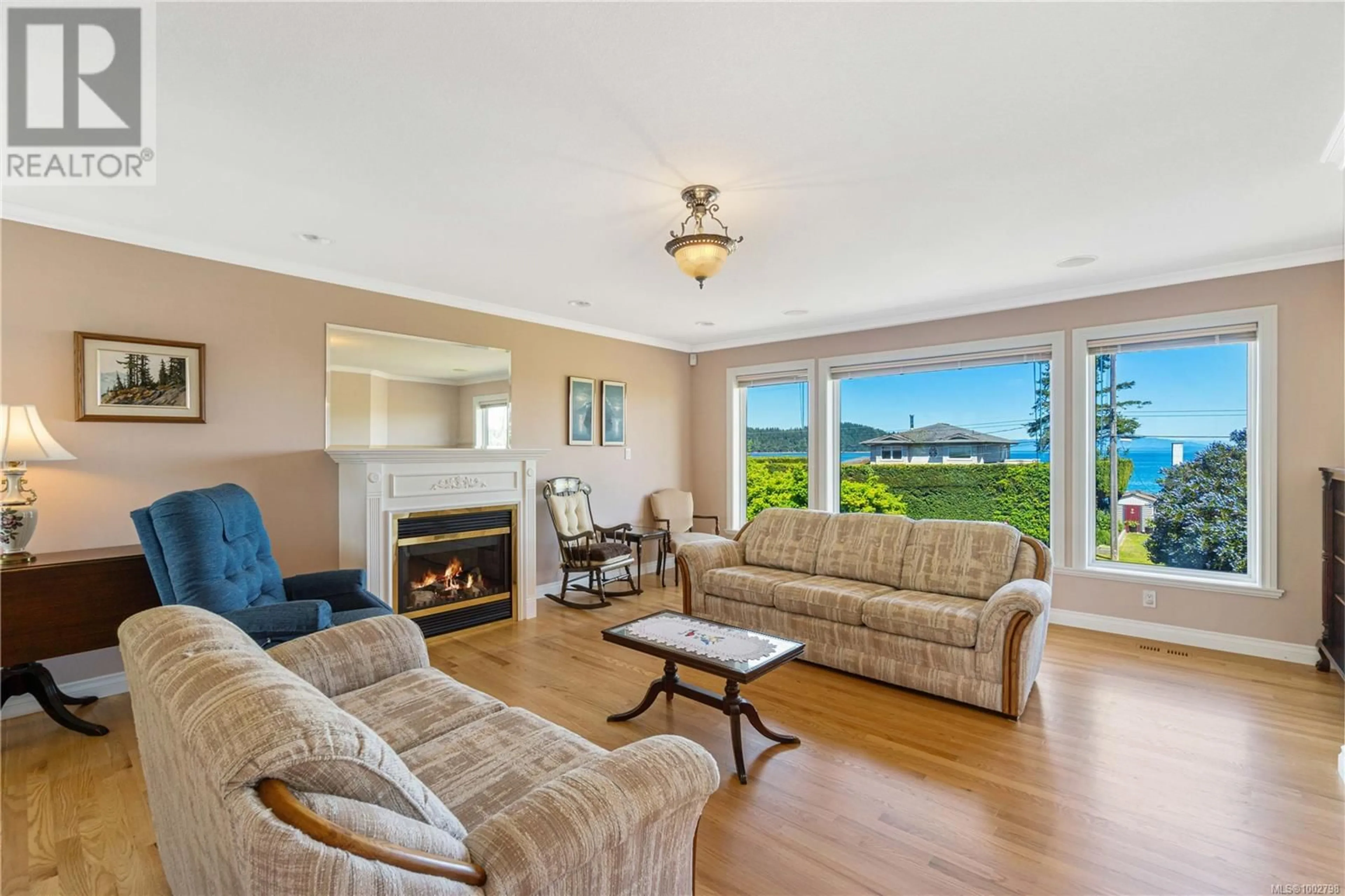 Living room with furniture, unknown for 5384 DEEP BAY DRIVE, Bowser British Columbia V0R1G0