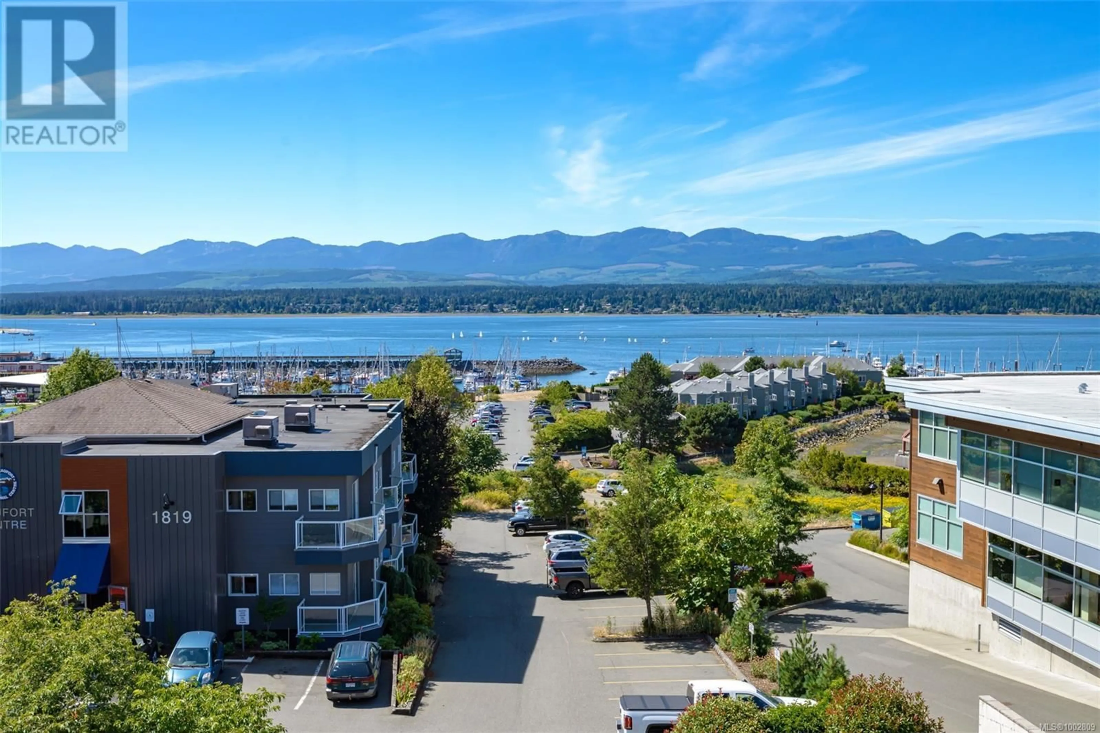 A pic from outside/outdoor area/front of a property/back of a property/a pic from drone, water/lake/river/ocean view for 201 - 1811 COMOX AVENUE, Comox British Columbia V9M3L9