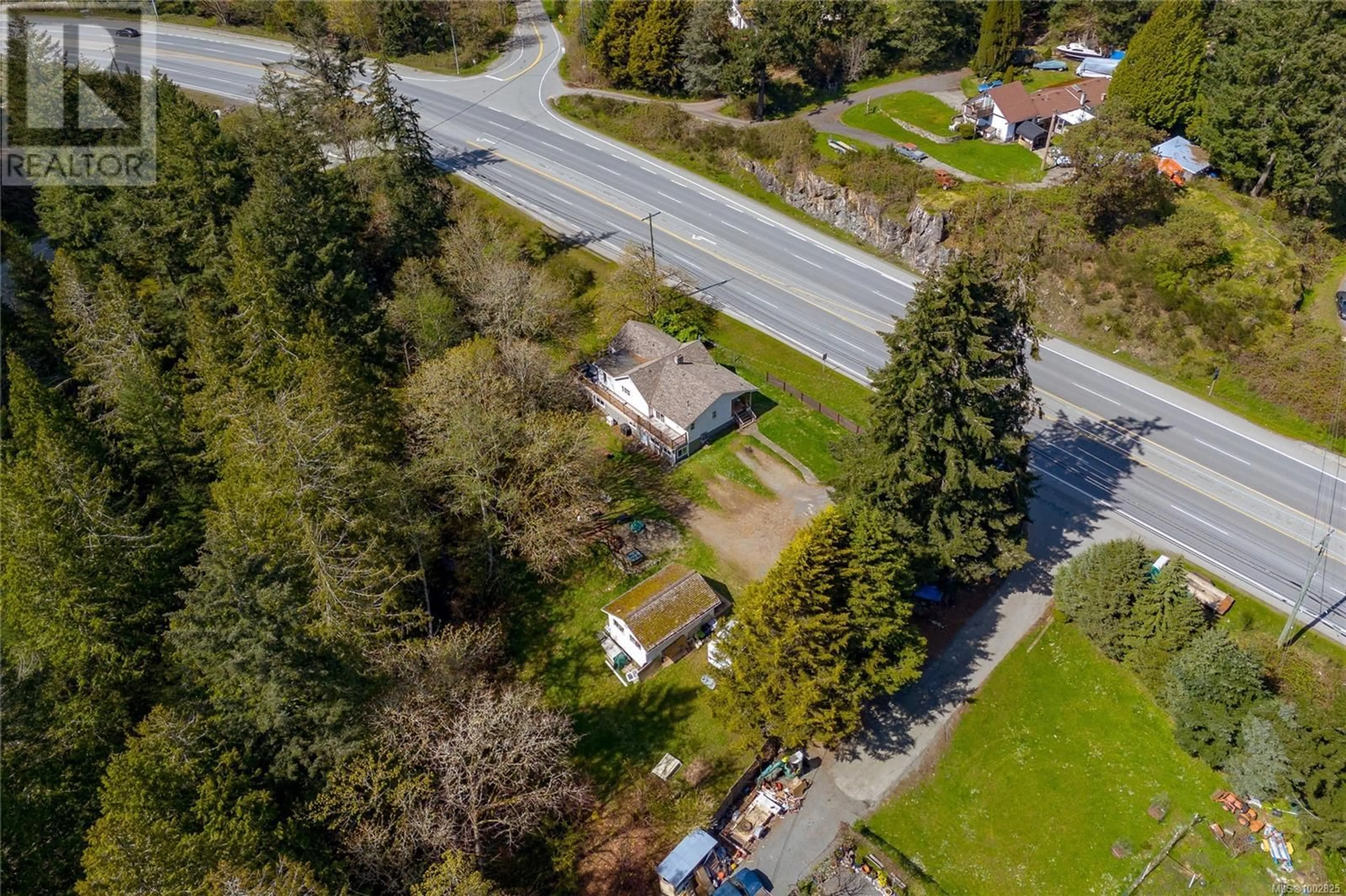 A pic from outside/outdoor area/front of a property/back of a property/a pic from drone, street for 3061 SOOKE ROAD, Langford British Columbia V9B5Y9