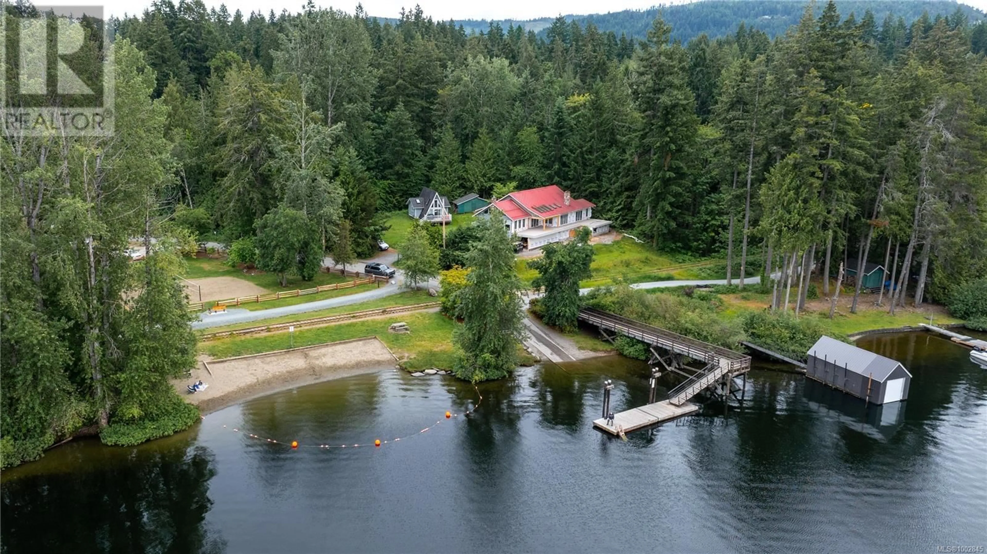A pic from outside/outdoor area/front of a property/back of a property/a pic from drone, water/lake/river/ocean view for 2719 DUNDAS ROAD, Shawnigan Lake British Columbia V0R2W0