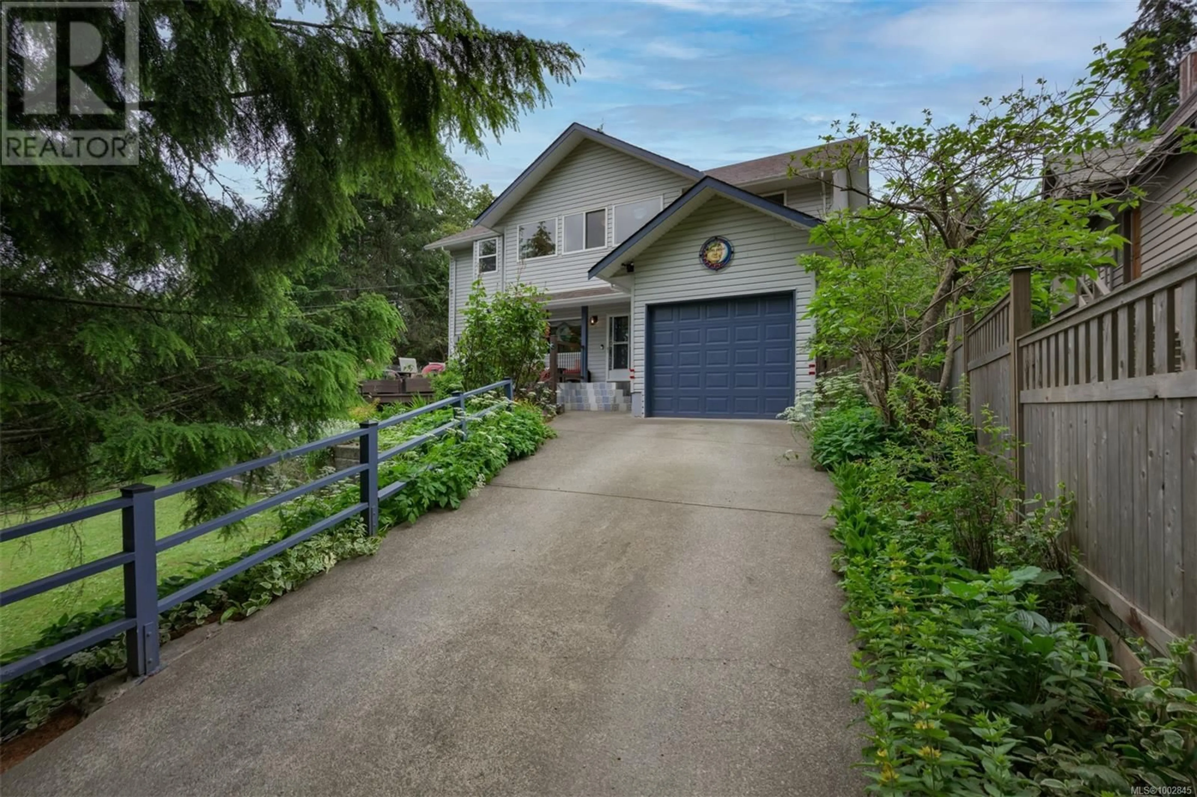 A pic from outside/outdoor area/front of a property/back of a property/a pic from drone, street for 2719 DUNDAS ROAD, Shawnigan Lake British Columbia V0R2W0