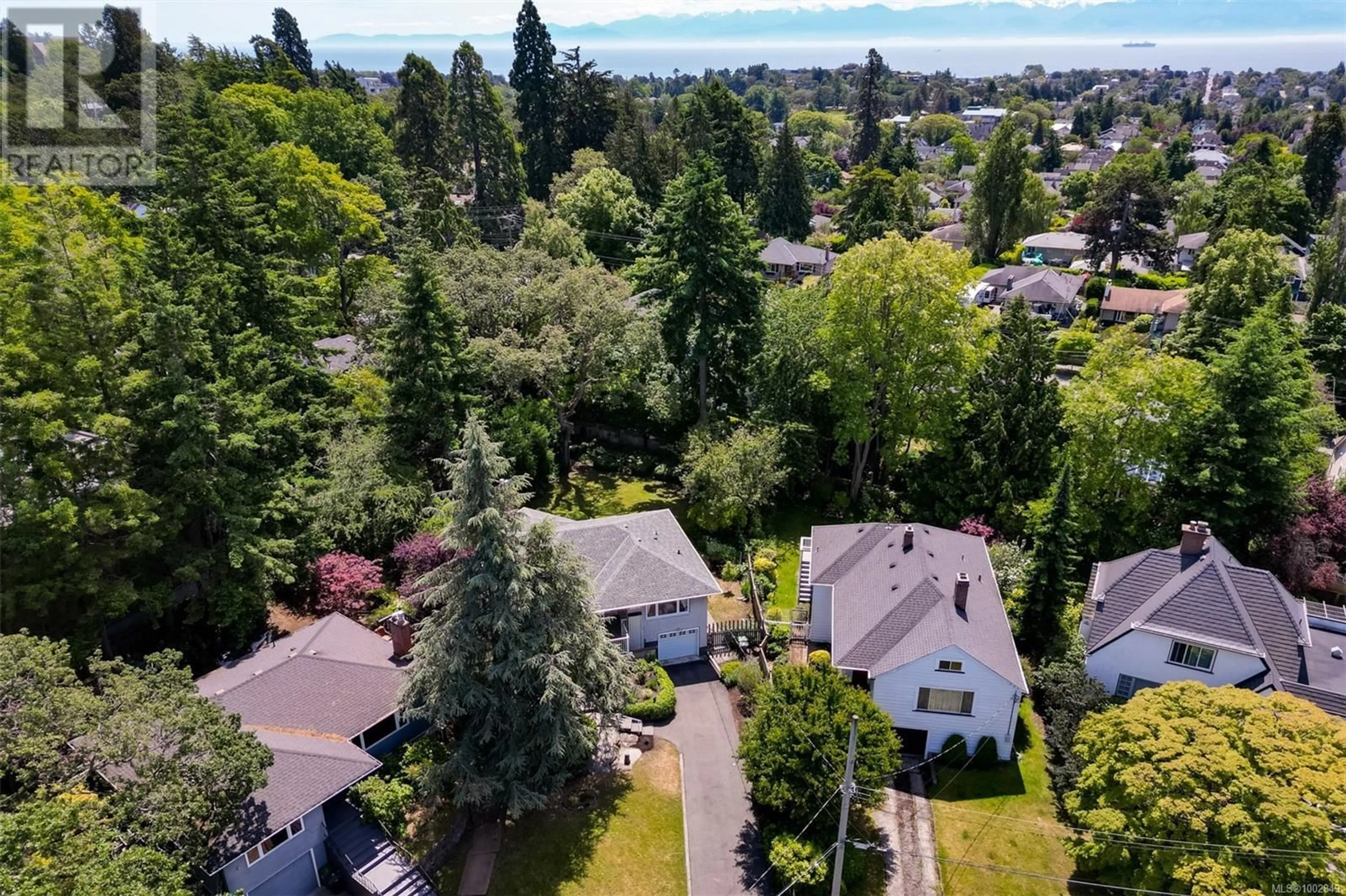 A pic from outside/outdoor area/front of a property/back of a property/a pic from drone, unknown for 1033 PENTRELEW PLACE, Victoria British Columbia V8V4J5