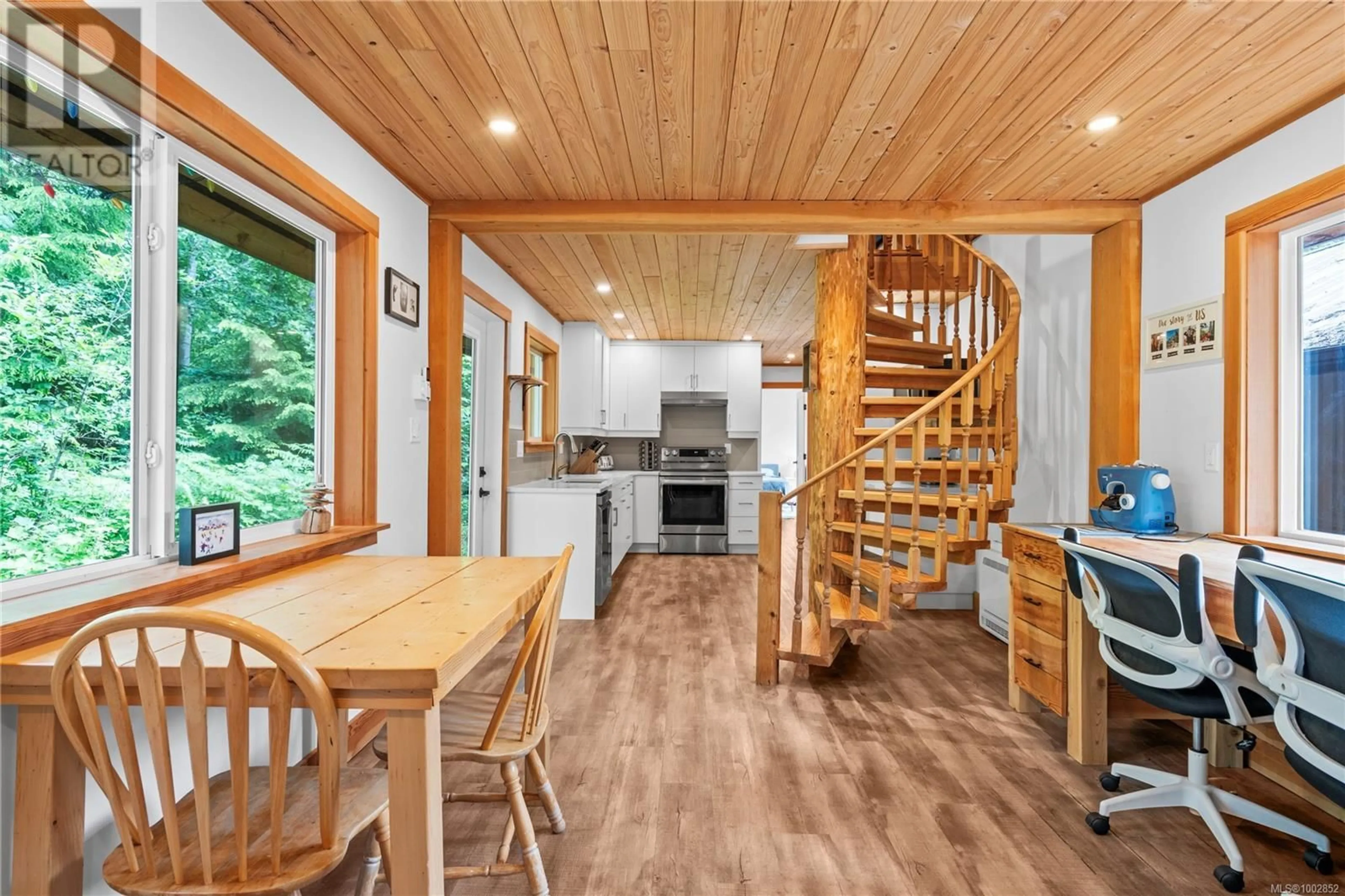 Open concept kitchen, wood/laminate floor for 1186 CHATSWORTH ROAD, Whiskey Creek British Columbia V9K1V6