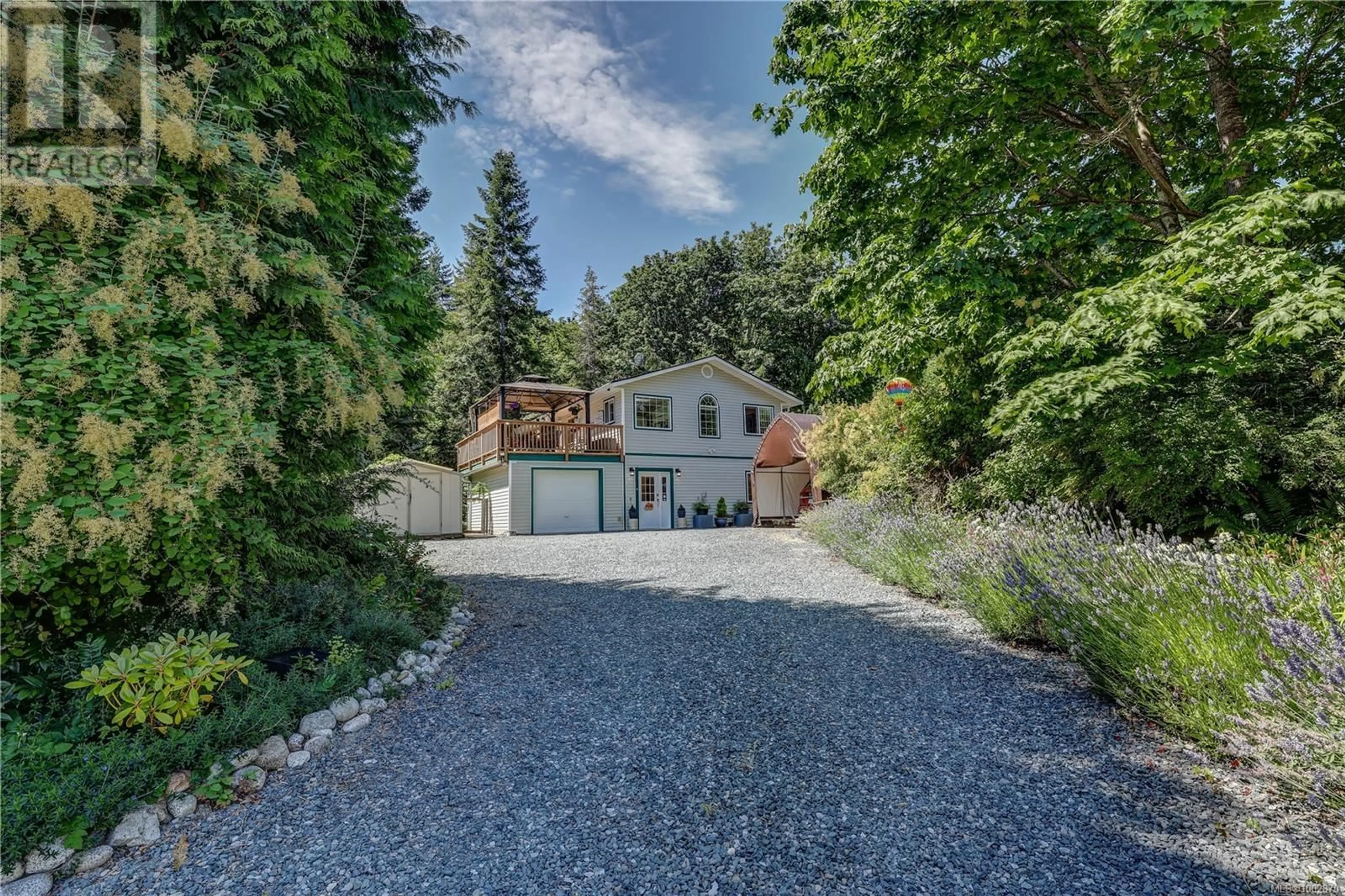 A pic from outside/outdoor area/front of a property/back of a property/a pic from drone, street for 4840 BLUE HERON DRIVE, Bowser British Columbia V0R1G0