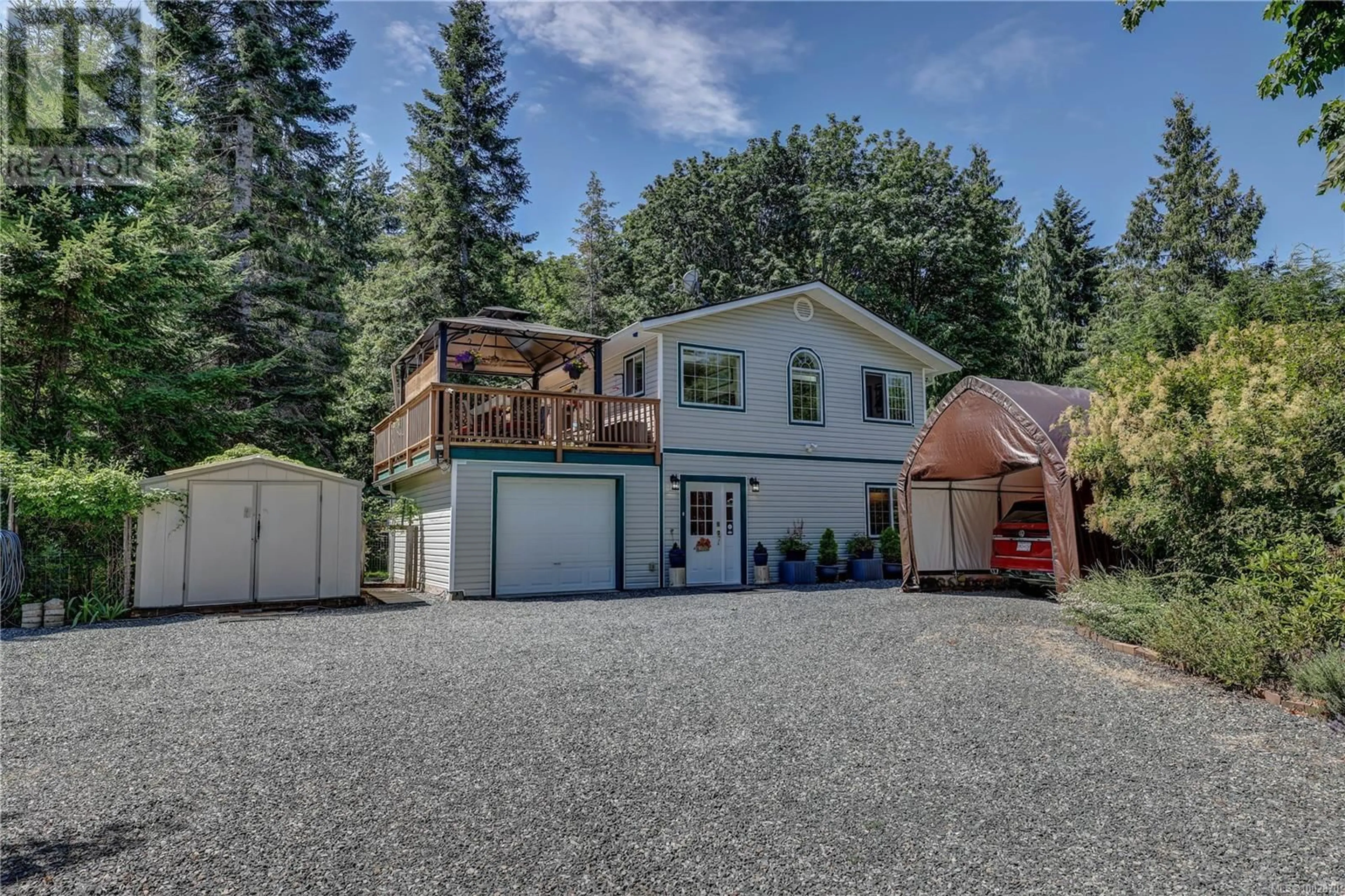 A pic from outside/outdoor area/front of a property/back of a property/a pic from drone, street for 4840 BLUE HERON DRIVE, Bowser British Columbia V0R1G0
