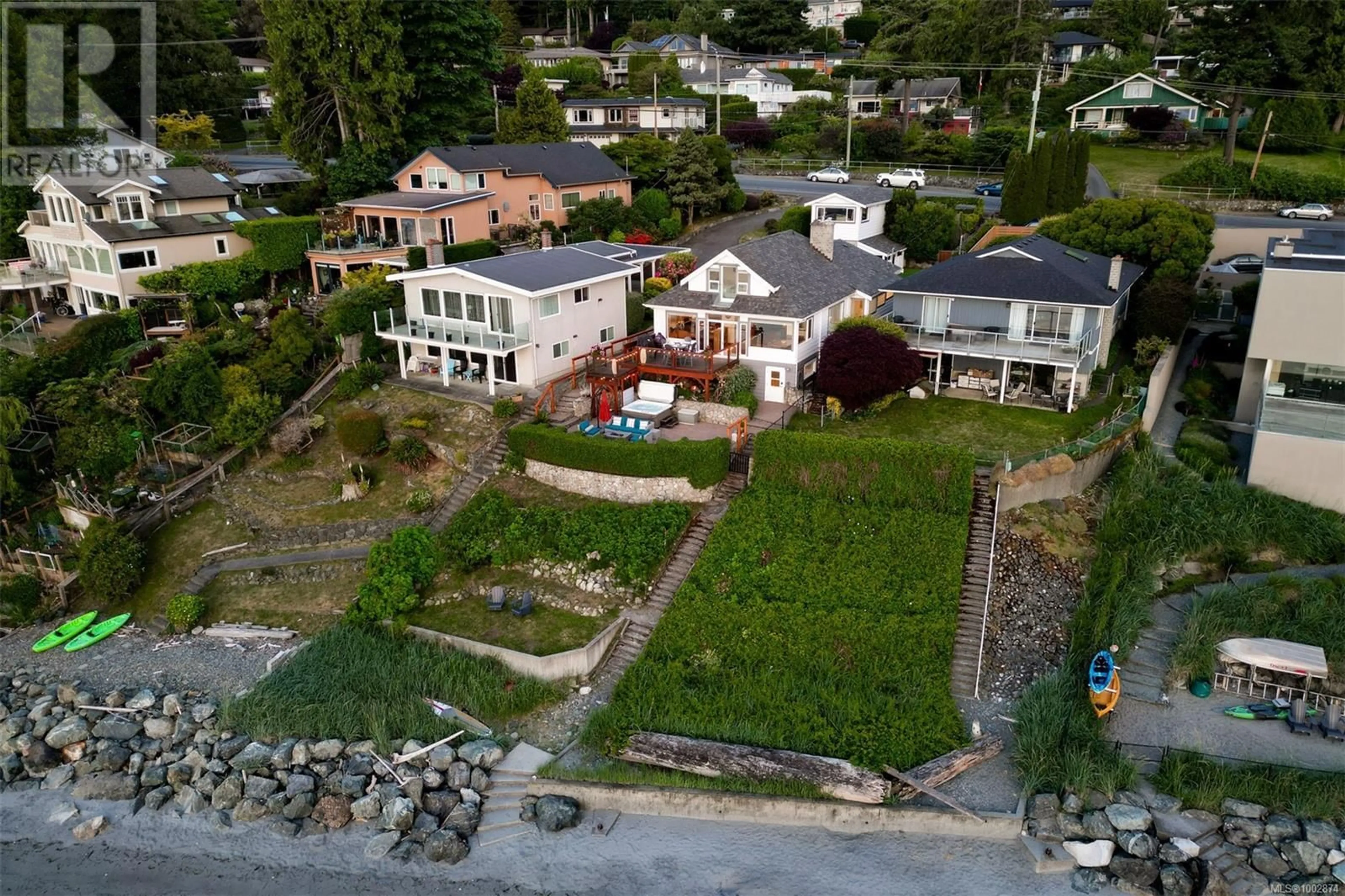 A pic from outside/outdoor area/front of a property/back of a property/a pic from drone, street for 4971 CORDOVA BAY ROAD, Saanich British Columbia V8Y2K1