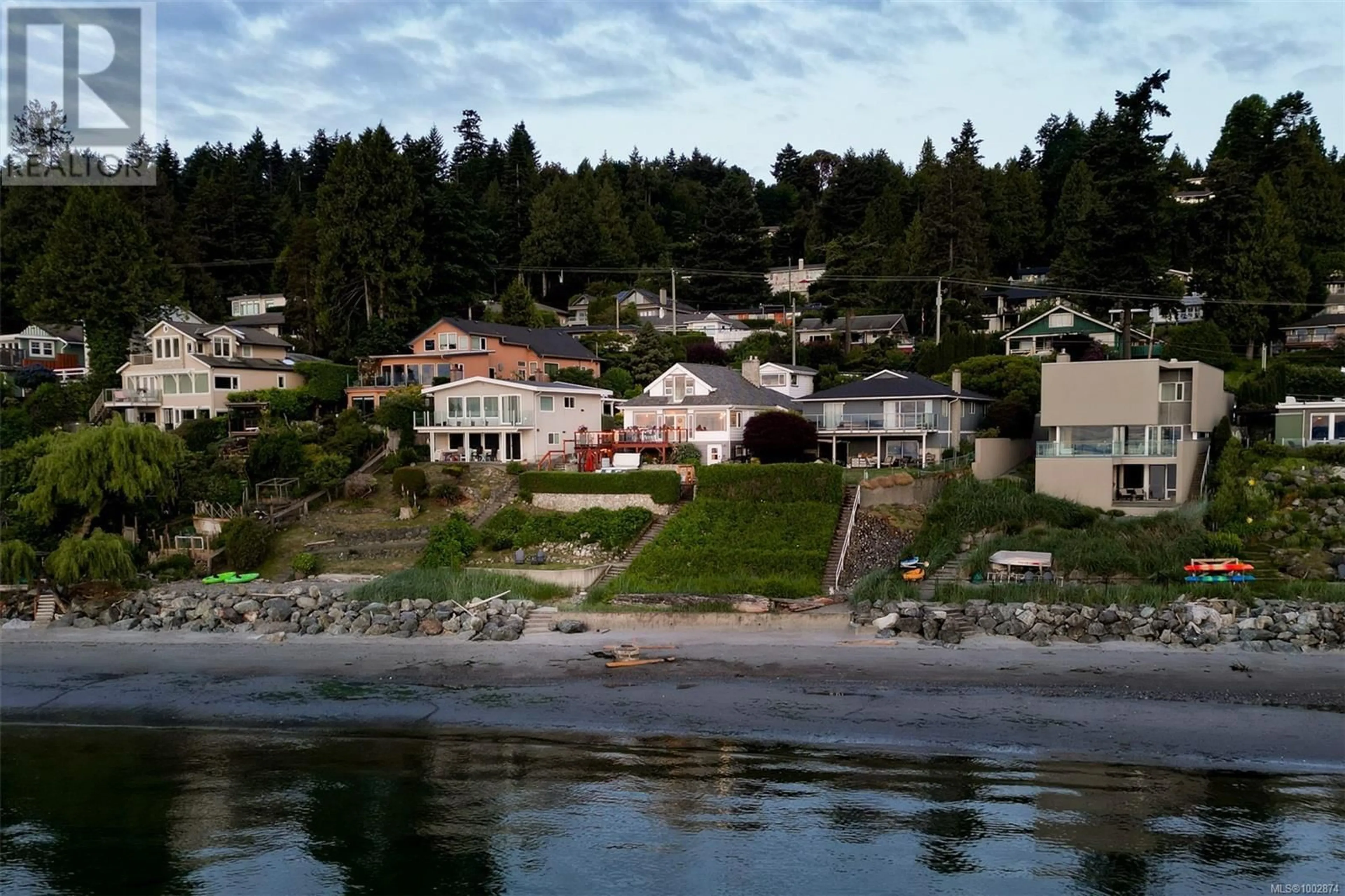 A pic from outside/outdoor area/front of a property/back of a property/a pic from drone, water/lake/river/ocean view for 4971 CORDOVA BAY ROAD, Saanich British Columbia V8Y2K1