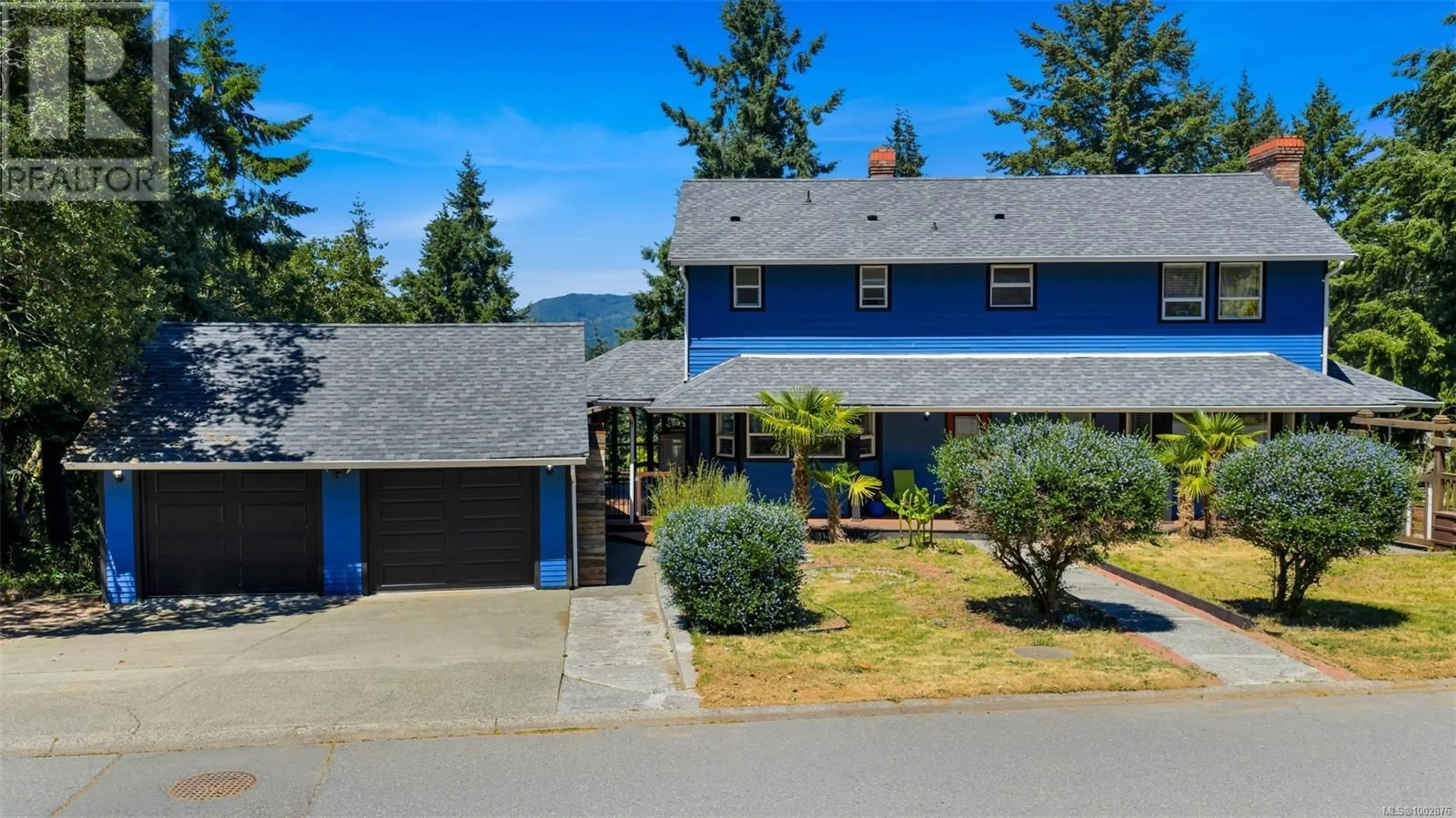A pic from outside/outdoor area/front of a property/back of a property/a pic from drone, water/lake/river/ocean view for 1437 BELCARRA ROAD, Duncan British Columbia V9L5P2