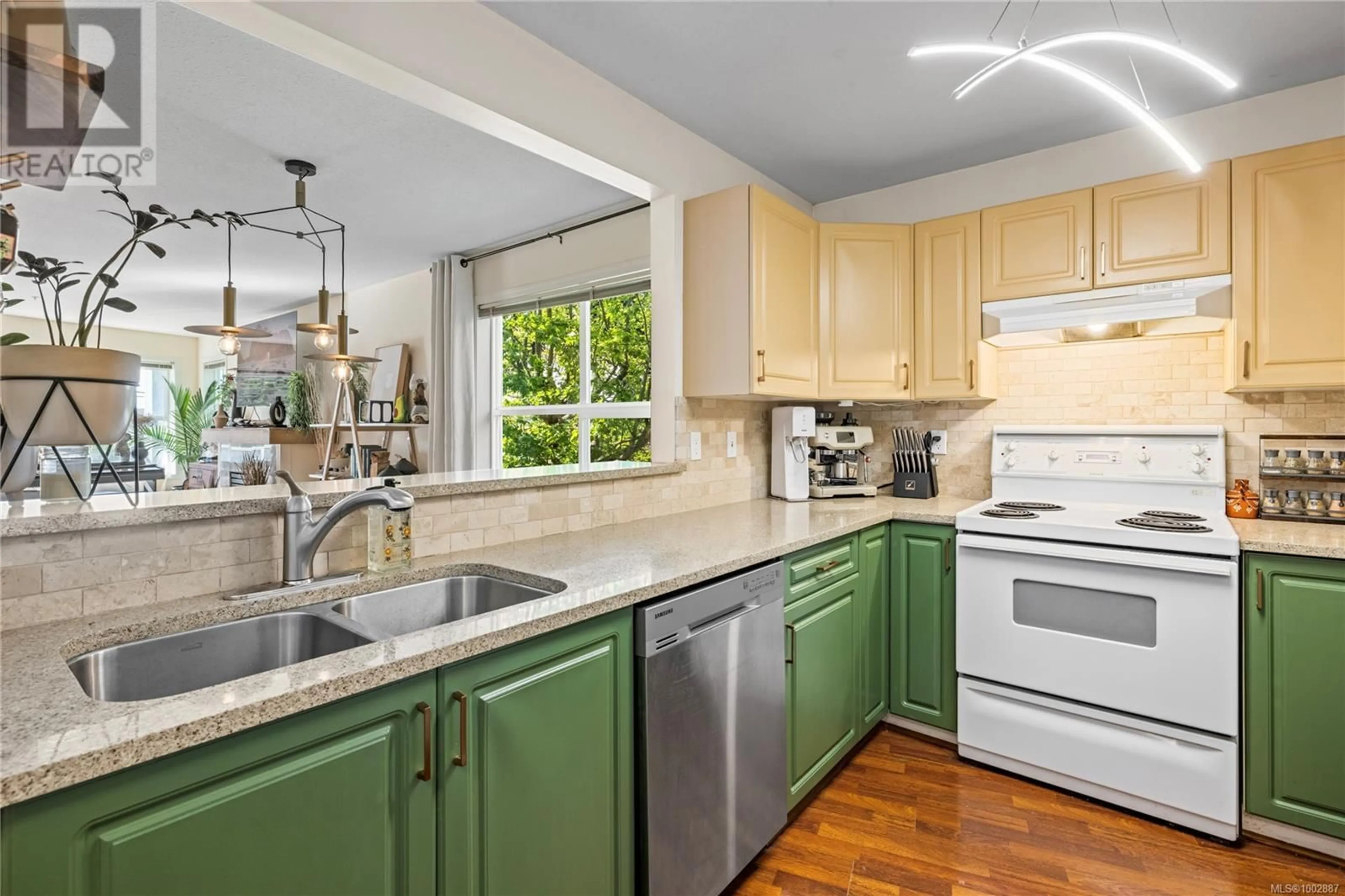 Open concept kitchen, ceramic/tile floor for 201 - 650 PRIDEAUX STREET, Nanaimo British Columbia V9R2P1