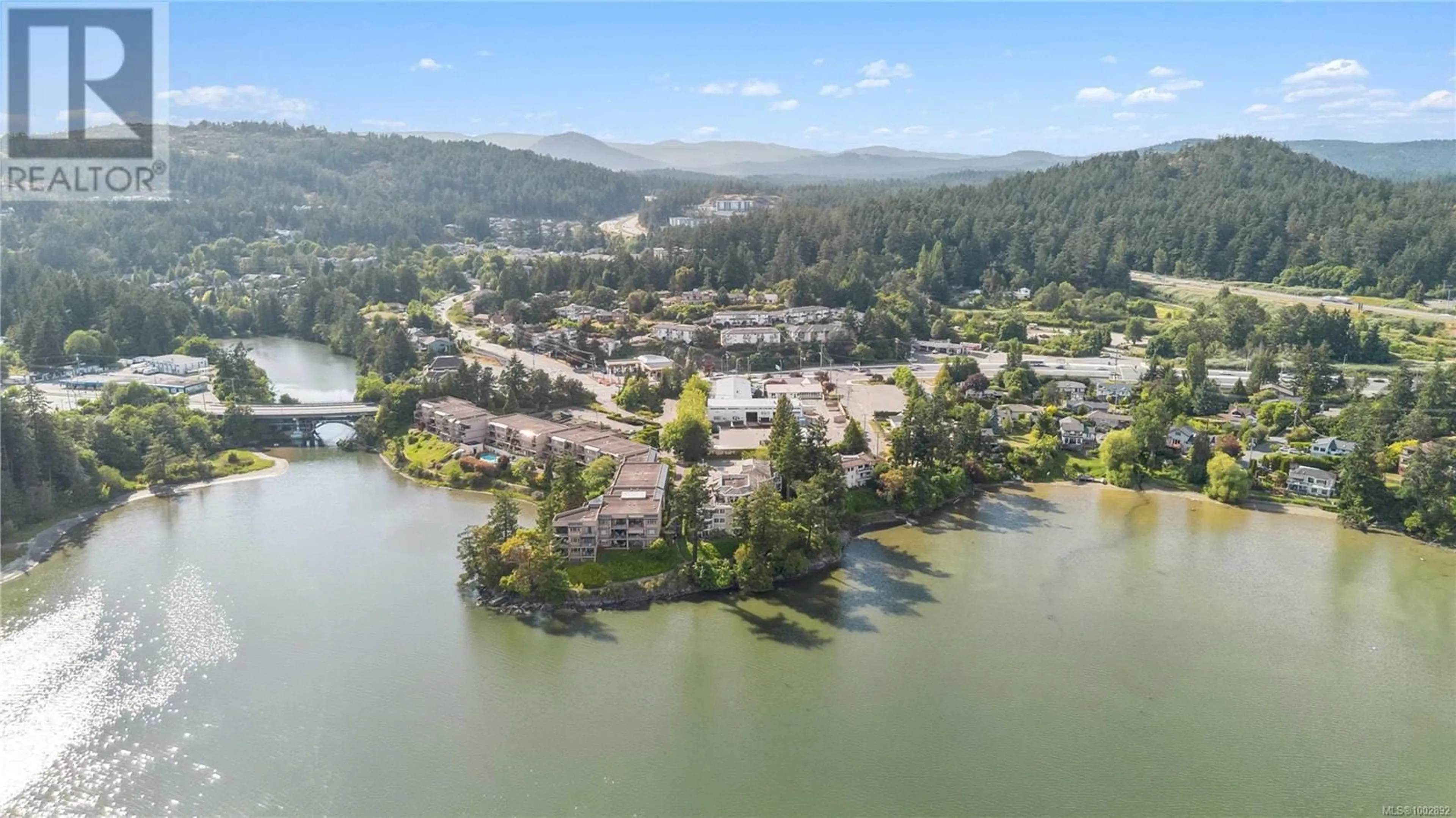A pic from outside/outdoor area/front of a property/back of a property/a pic from drone, water/lake/river/ocean view for 302 - 1 BUDDY ROAD, View Royal British Columbia V9B1V6