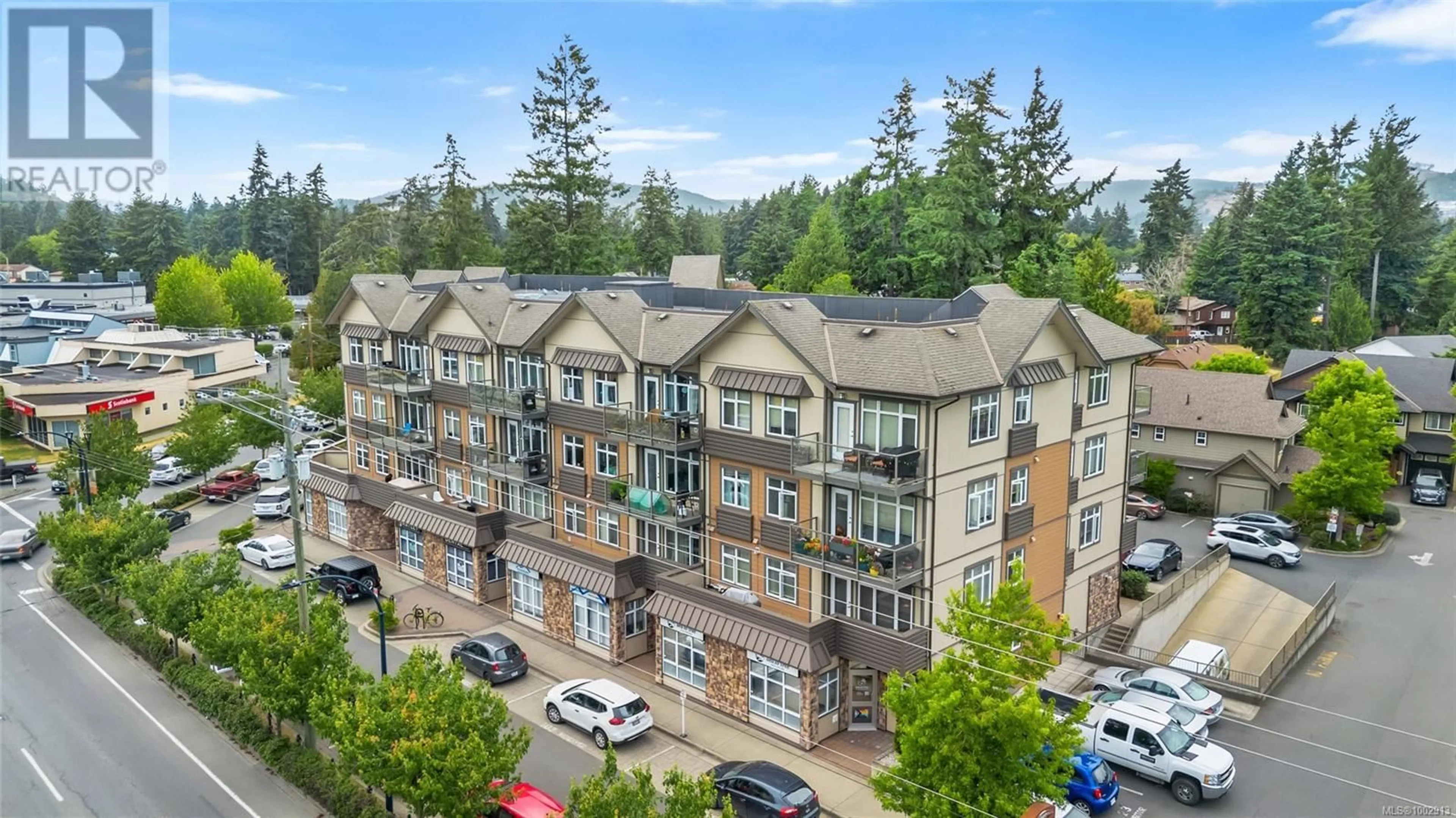 A pic from outside/outdoor area/front of a property/back of a property/a pic from drone, unknown for 407 - 2220 SOOKE ROAD, Colwood British Columbia V9B0G9
