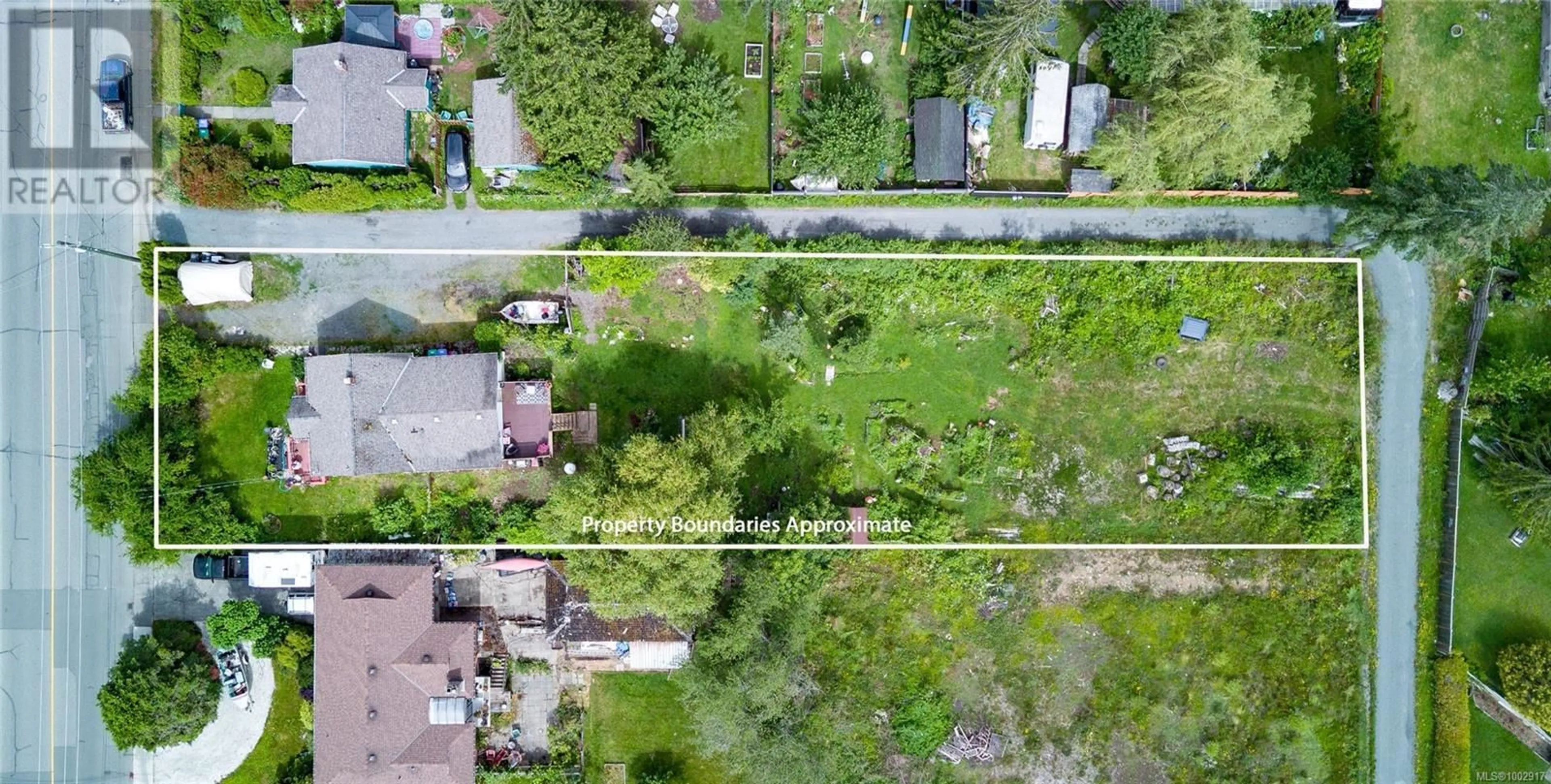 A pic from outside/outdoor area/front of a property/back of a property/a pic from drone, street for 1530 WILLEMAR AVENUE, Courtenay British Columbia V9N3M3