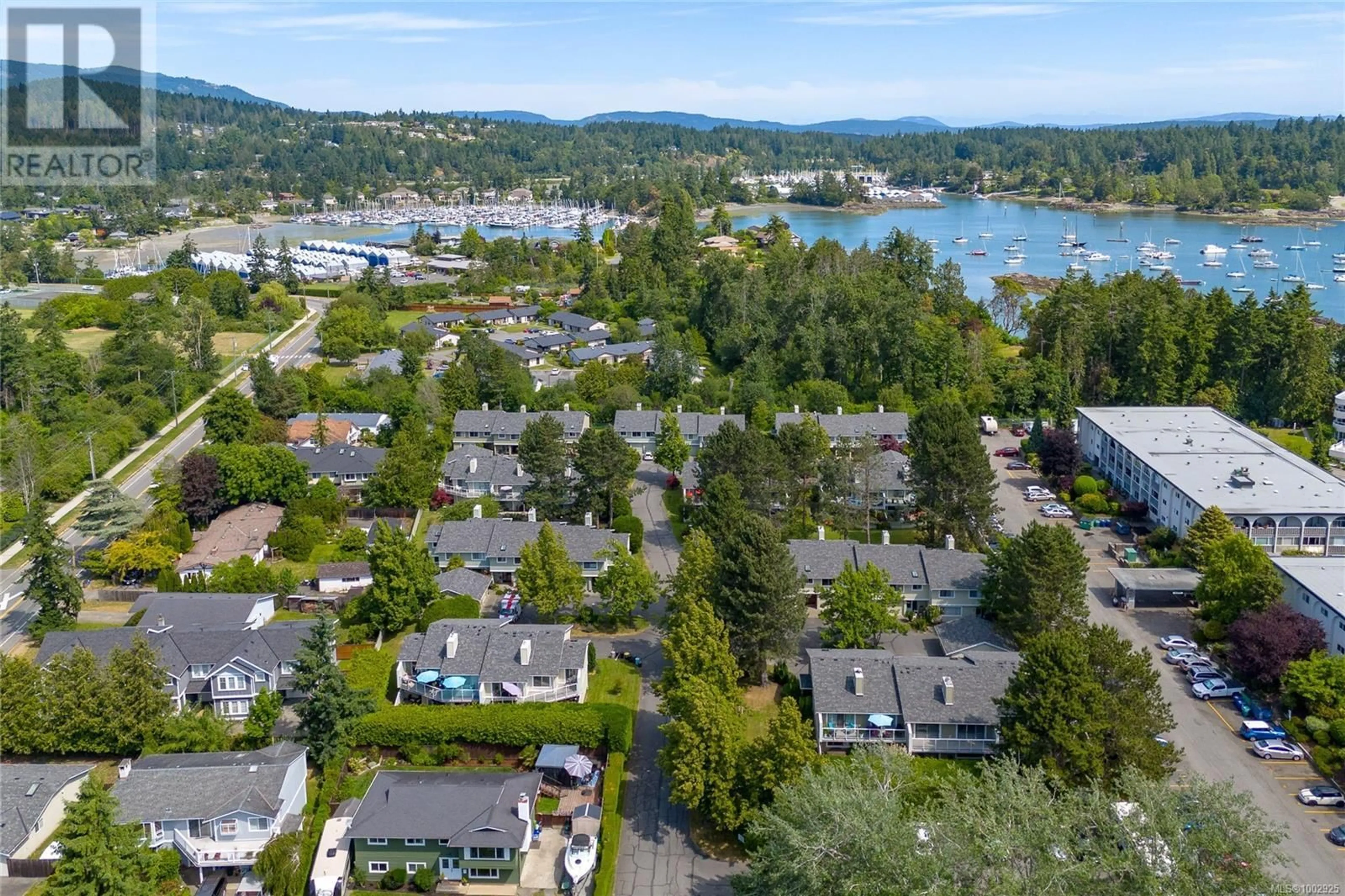 A pic from outside/outdoor area/front of a property/back of a property/a pic from drone, water/lake/river/ocean view for 7 - 2020 WHITE BIRCH ROAD, Sidney British Columbia V8L2R1