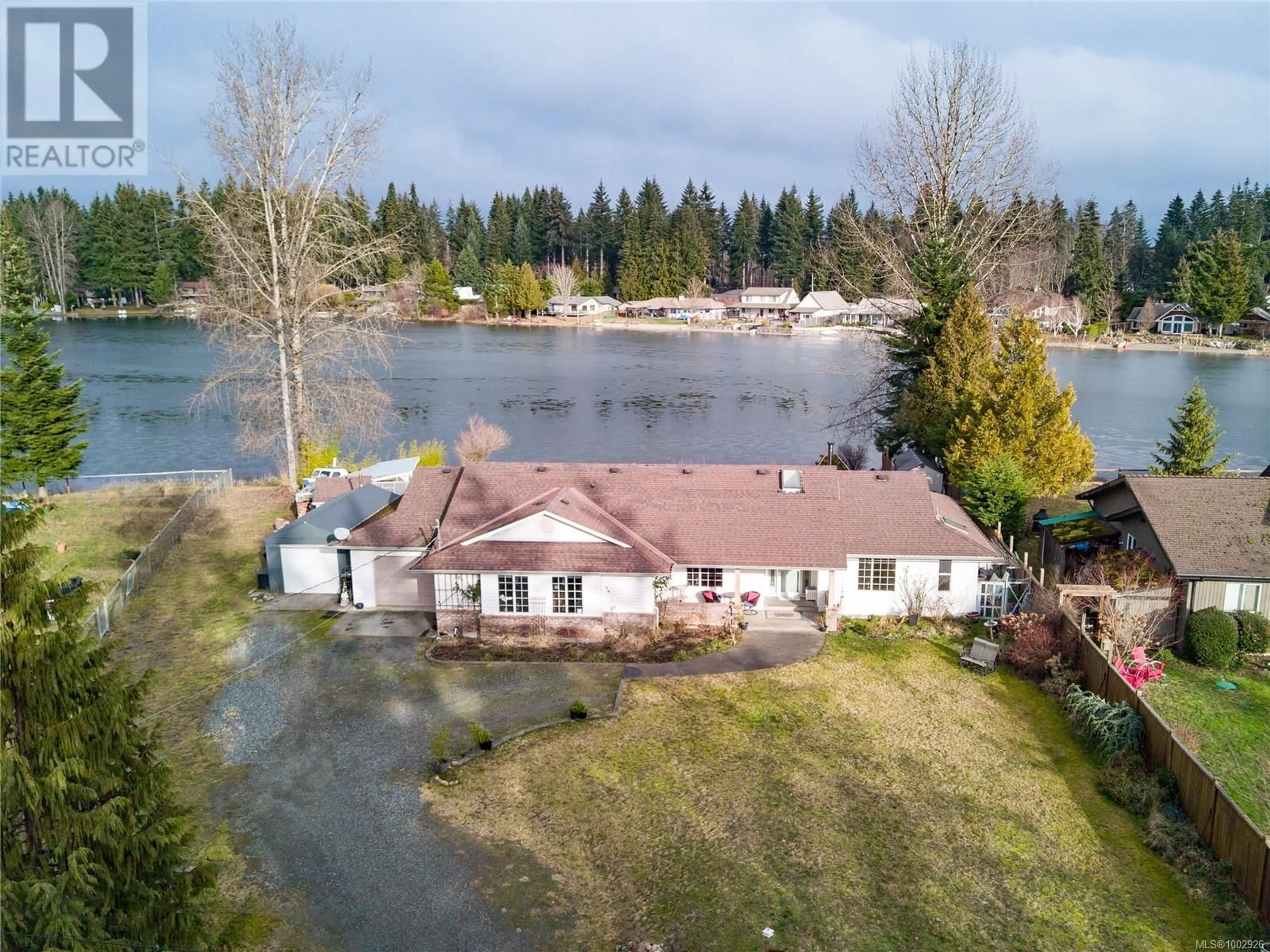 A pic from outside/outdoor area/front of a property/back of a property/a pic from drone, water/lake/river/ocean view for 9536 MARTIN PARK DRIVE, Black Creek British Columbia V9J1C3
