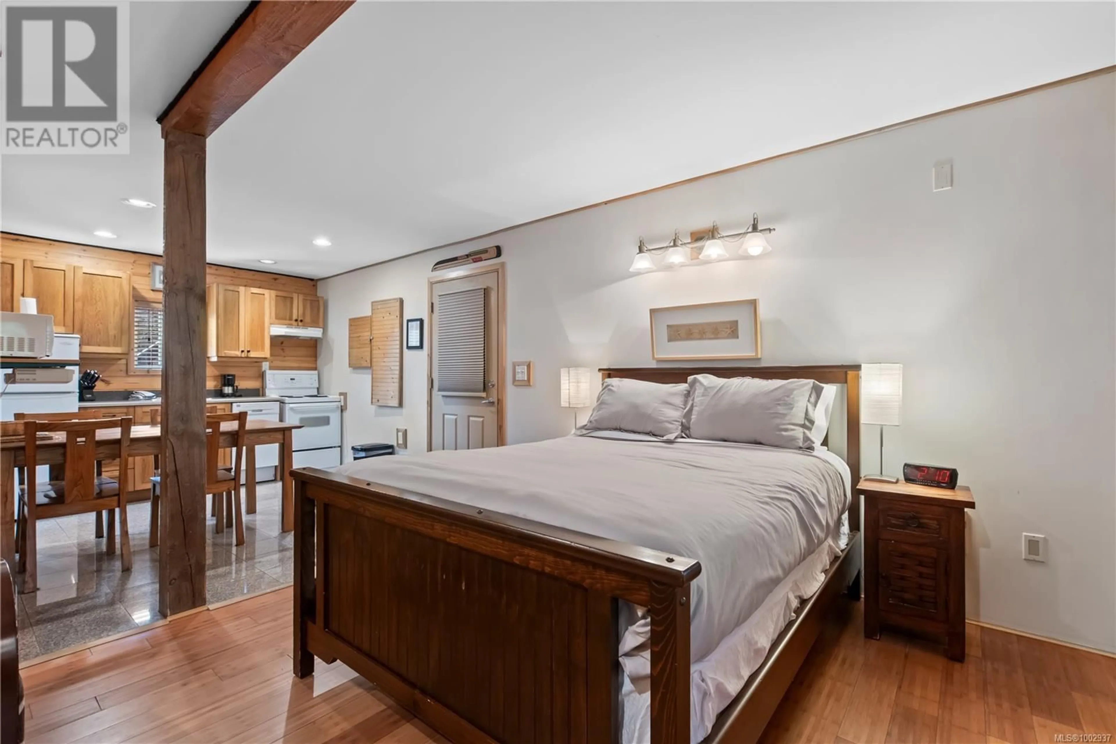 Bedroom with bed, wood/laminate floor for 277 BOARDWALK BOULEVARD, Ucluelet British Columbia V0R3A0