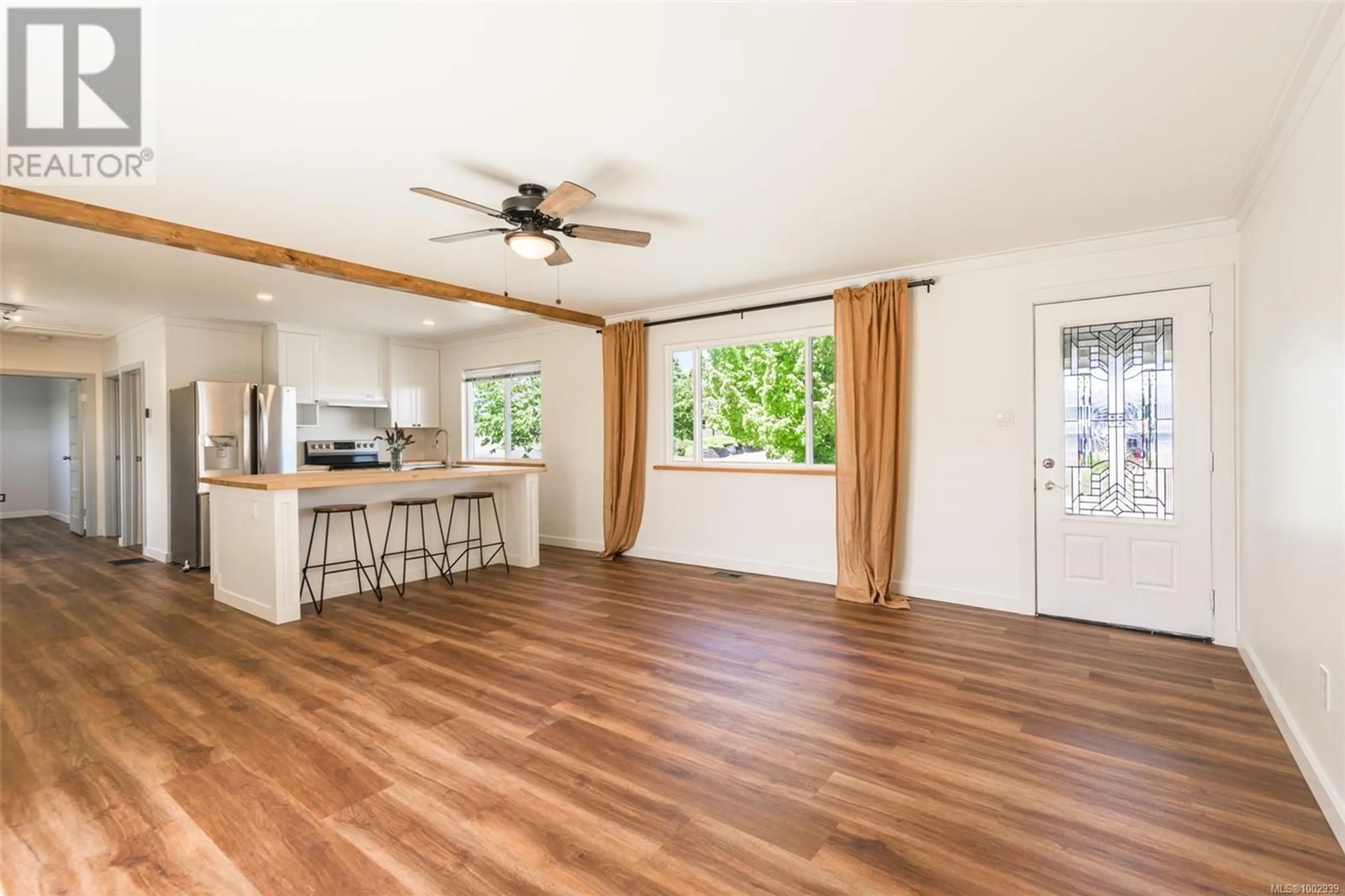 Open concept kitchen, wood/laminate floor for 2546 HADDINGTON CRESCENT, Port McNeill British Columbia V0N2R0