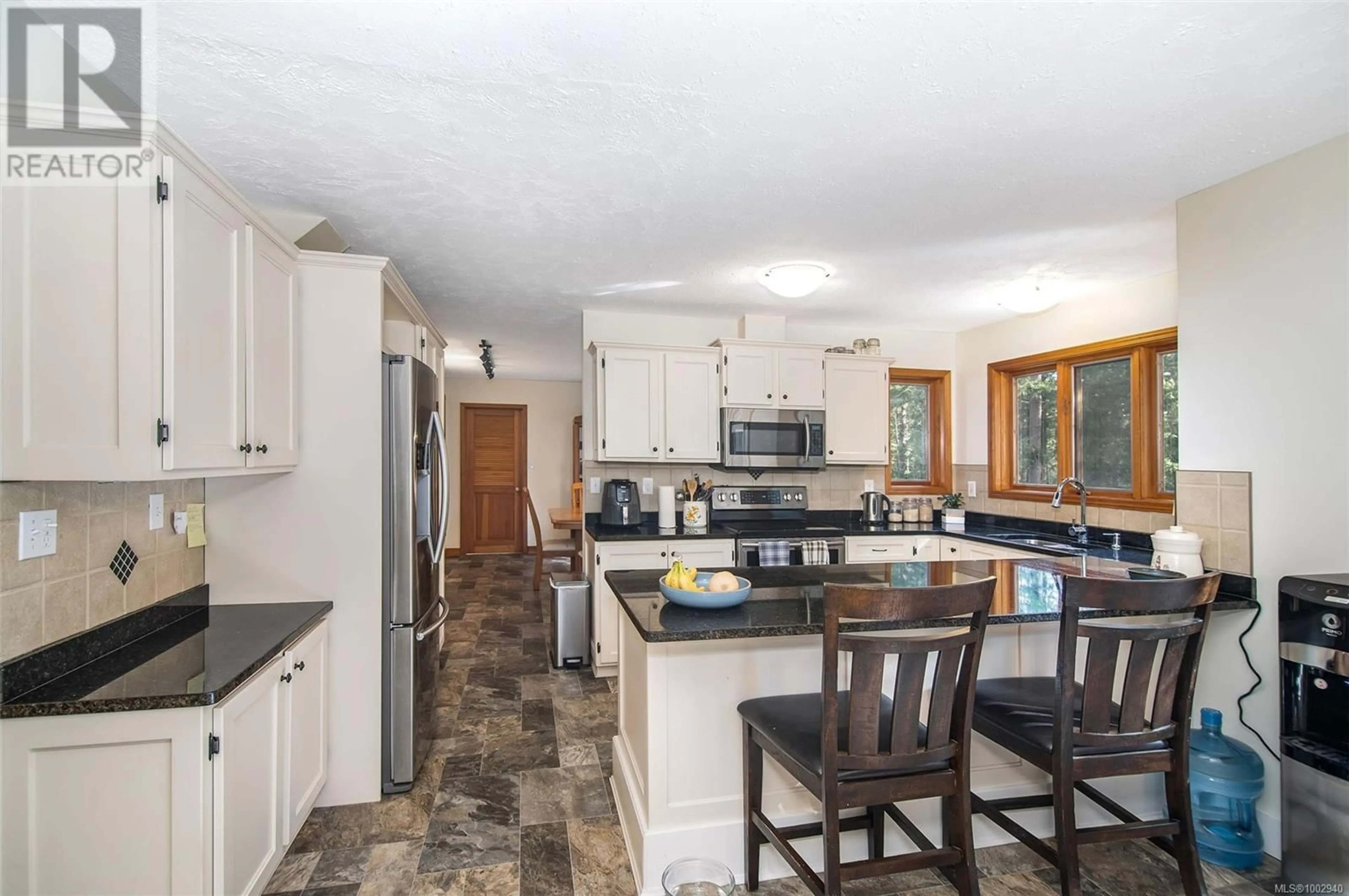 Open concept kitchen, ceramic/tile floor for 3835 JAMES CRESCENT, Black Creek British Columbia V9J1G1